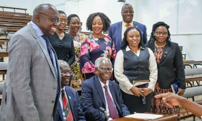 Assoc. Professor Richard Idro (Left) with staff and stakeholders at the Exhibition Opening on 8th December 2025. Centennial Exhibition marking 100 years of Makerere University College of Health Sciences (MakCHS) opening 8th December 2025, Sir Albert Cook Library, Mulago Hill, Kampala Uganda, East Africa.