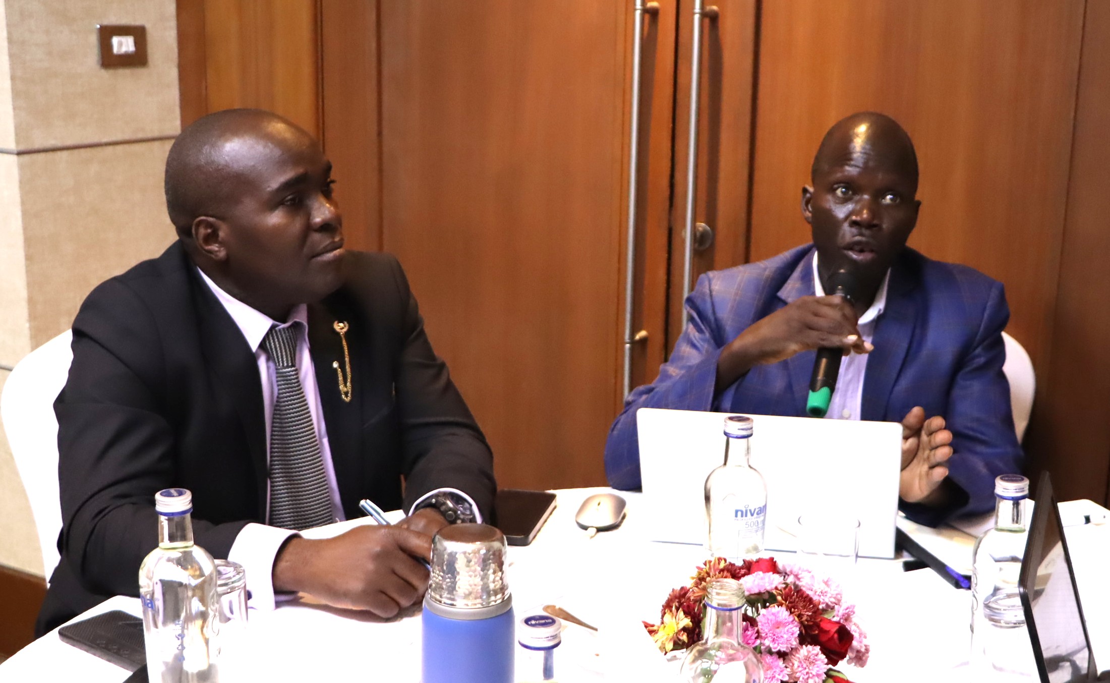 Dr. John Sseruyange and IGE Fellow Thomas Opeet during the plenary discussions. The high-level annual workshop organised by the Environment for Development (EfD) Makerere University Centre through its regional Inclusive Green Economy (IGE) Programme to draw a roadmap for accelerating the adoption of Climate Smart Agriculture (CSA) as Uganda struggles with rising climate shocks, stagnating agricultural productivity and worsening poverty levels, held on December 4, 2025 at the Sheraton Kampala Hotel, Uganda, East Africa.