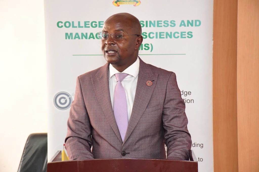 The Principal of CoBAMS, Prof. Edward Bbaale giving his remarks at the launch of the working paper series. College of Business and Management Sciences (CoBAMS) Working Paper Series 2025 launch by Prof. Sarah Ssali. It consists of over 60 working papers with research set to transform society, inform policy formulation, decision making, governance, development. 4th December 2025, CoBAMS Conference Room, Block B, School of Business, Makerere University, Kampala Uganda, East Africa.