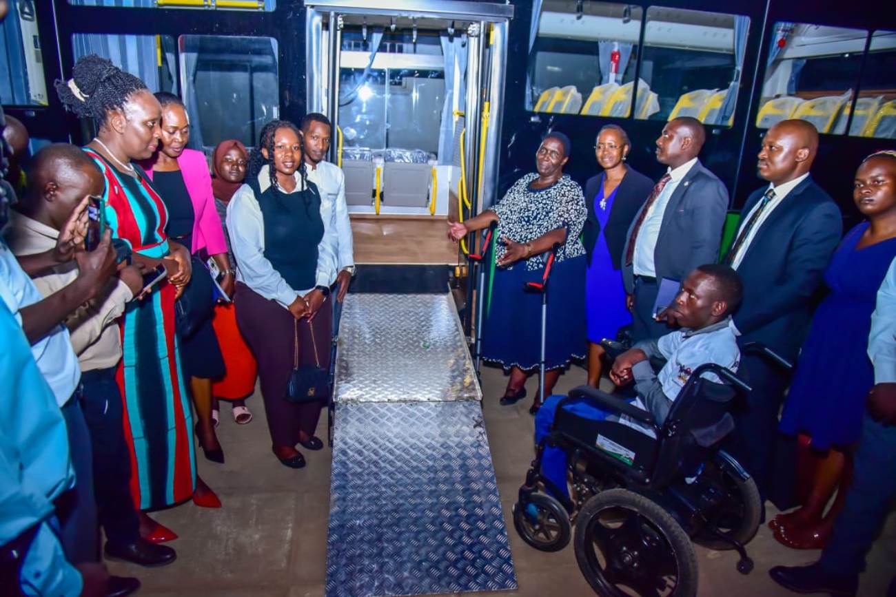 Hon. Asamo and officials at the official launch of the bus donated by Kiira Motors Corporation to ease mobility of students and staff with disabilities. Makerere University International Day of Persons with Disabilities Celebration, a moment dedicated to reflection on inclusion and shared responsibility organised by the Dean of Students and 91st Guild Ministry of Students with Disabilities, 1st December 2025, Main Hall, Kampala Uganda, East Africa.