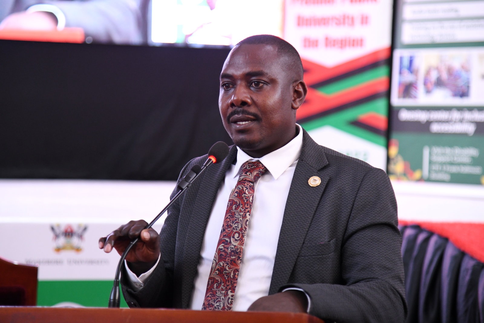 Mr. Amon Muteganda. Makerere University International Day of Persons with Disabilities Celebration, a moment dedicated to reflection on inclusion and shared responsibility organised by the Dean of Students and 91st Guild Ministry of Students with Disabilities, 1st December 2025, Main Hall, Kampala Uganda, East Africa.