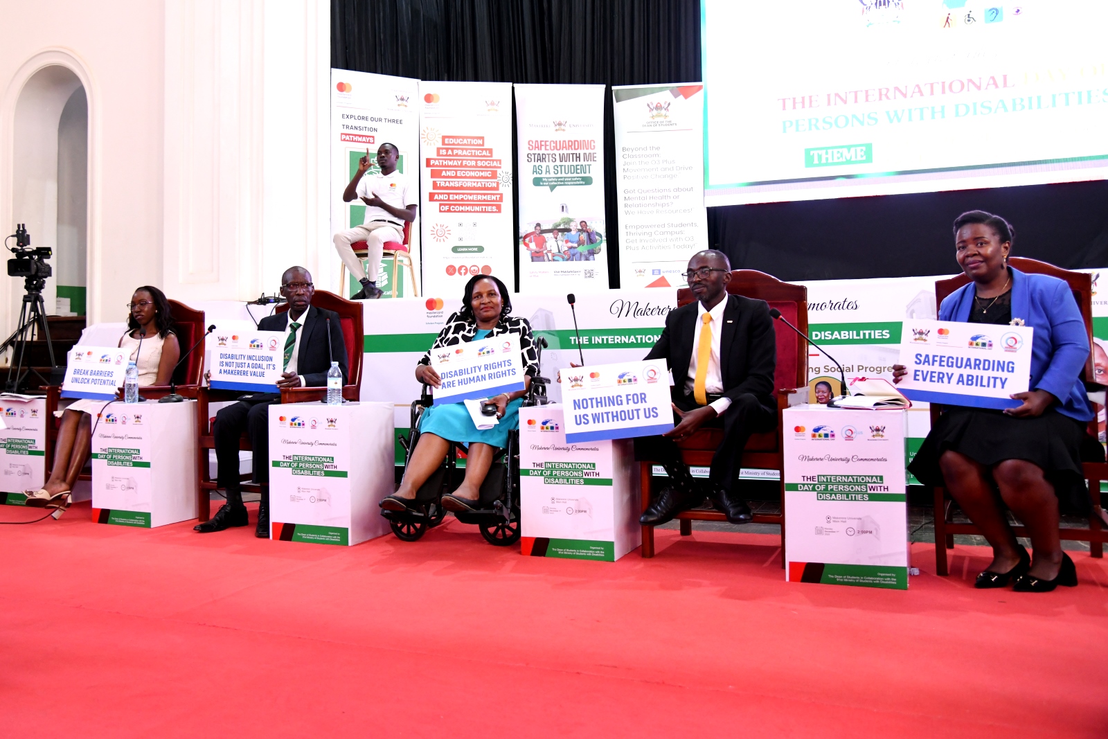 Right to Left: Moderator-Dr. Diana Ateenyi Ahumuza with Panelists-Dr. Naboth Rwakazwaire, Lord Councillor Peace Sserunkuma, Prof. Anthony Muwagga Mugagga, and Ms. Catherine Nakibuuka. Makerere University International Day of Persons with Disabilities Celebration, a moment dedicated to reflection on inclusion and shared responsibility organised by the Dean of Students and 91st Guild Ministry of Students with Disabilities, 1st December 2025, Main Hall, Kampala Uganda, East Africa.