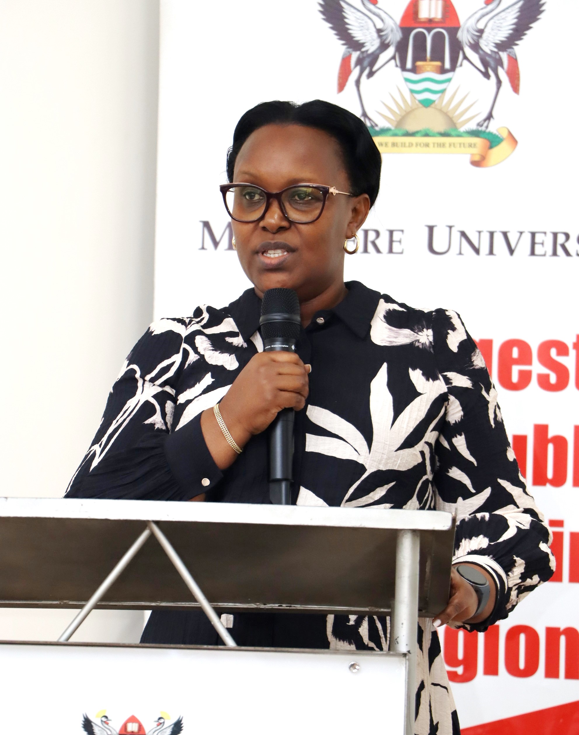 Director Strategy and Innovation at Bank of Uganda, Ms Prisca Ampumuza Rwamahe addressing participants. Makerere University high-level policy dialogue bringing together the Environment for Development (EfD-Mak) Centre, Green Gas + Reforestation + Offset (GRO)  and  Bank of Uganda, to explore alternative financing mechanisms for climate action and sustainable development, 3rd December 2025, Seminar Room 1, Main Building, Makerere University, Kampala Uganda, East Africa.