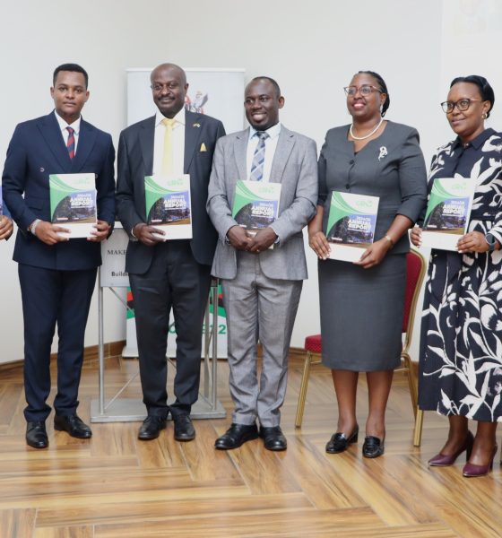 Panelists and some speakers posing for a photo with the GRO Annual report on 3rd December 2025. Makerere University high-level policy dialogue bringing together the Environment for Development (EfD-Mak) Centre, Green Gas + Reforestation + Offset (GRO)  and  Bank of Uganda, to explore alternative financing mechanisms for climate action and sustainable development, 3rd December 2025, Seminar Room 1, Main Building, Makerere University, Kampala Uganda, East Africa.
