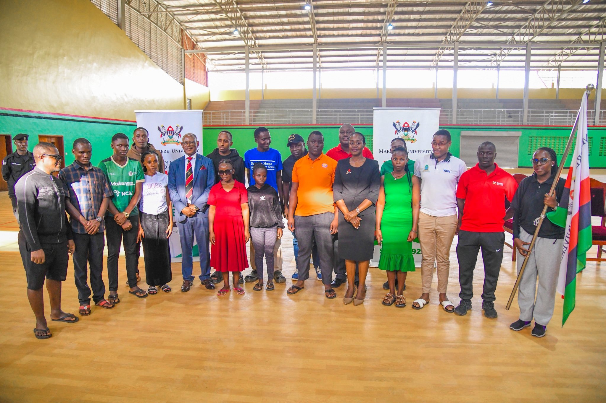 Officials pose for a group photo with student-athletes with disabilities who are set to represent Makerere in the 20th AUUS Games. Prof. Barnabas Nawangwe officially flags off a contingent of 220 students, 13 coaches and 3 tutors from the Makerere University Games Union on 17th December 2025 at the Indoor Sports Arena to the 20th Edition of the Association of Uganda University Sports (AUUS) Games, 18th-23rd December 2025, Uganda Christian University (UCU) Mukono, Uganda, East Africa.