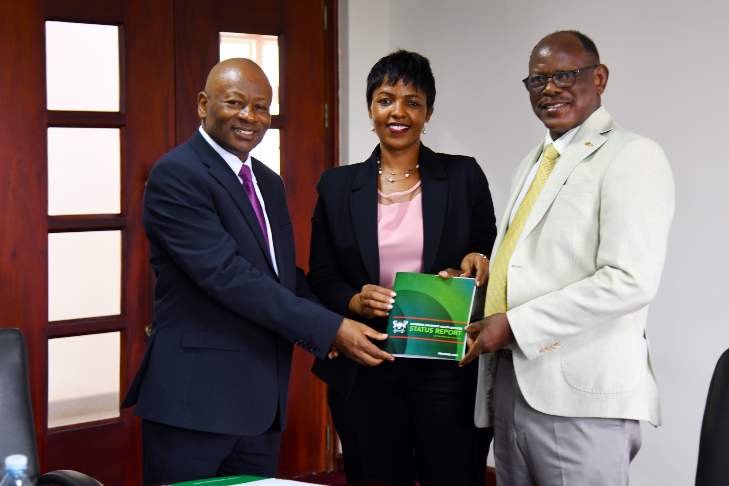 Prof. Barnabas Nawangwe (Right) receives the Mak-HUC Status Report from the Chairperson-Dr. Allen Kabagenyi (Centre) and Chief MakHC-Prof. Josaphat Byamugisha (Left) on 11th December 2025. Makerere University Health User Committee (Mak-HUC)—established by the Vice Chancellor in 2022 as part of his strategic mandate to strengthen and oversee the University’s health service delivery-official handover of status report, 11th December 2025, Main Building, Kampala Uganda, East Africa.