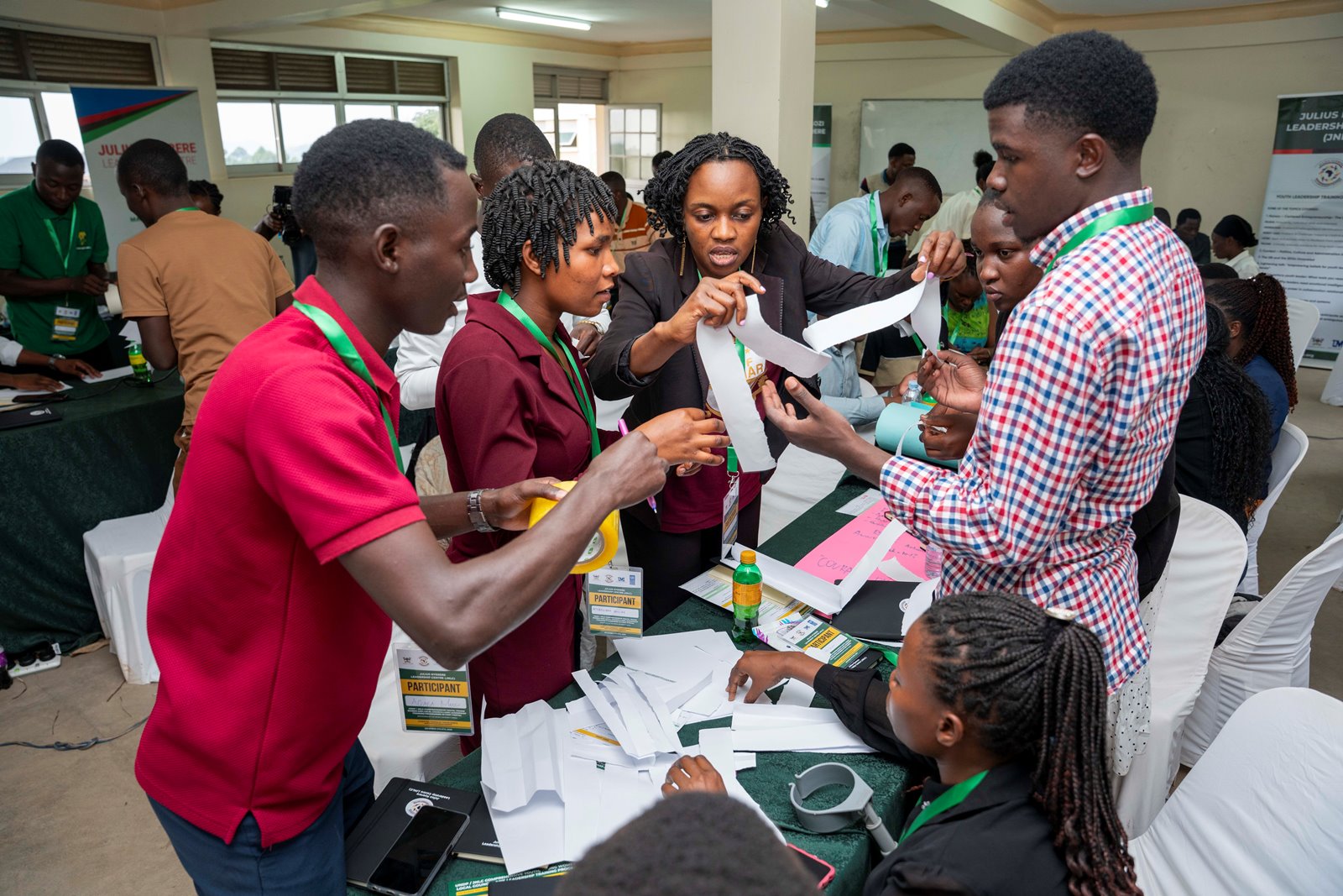 Participants concentrate on a team building exercise on Day 2 of the training. Makerere University, Julius Nyerere Leadership Centre (JNLC) in partnership with the United Nations Development Programme (UNDP), three-day comprehensive leadership training targeting youth, young women, and local council leaders for more than 70 participants starting 5th December 2025 at Mountains of the Moon University (MMU) in Fort Portal City Uganda, East Africa.