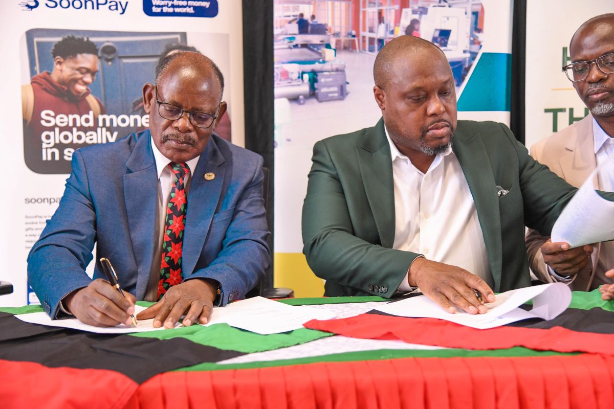 Prof. Barnabas Nawangwe (L) and Mr. Frantz Morency sign the agreement on 6th December 2025.