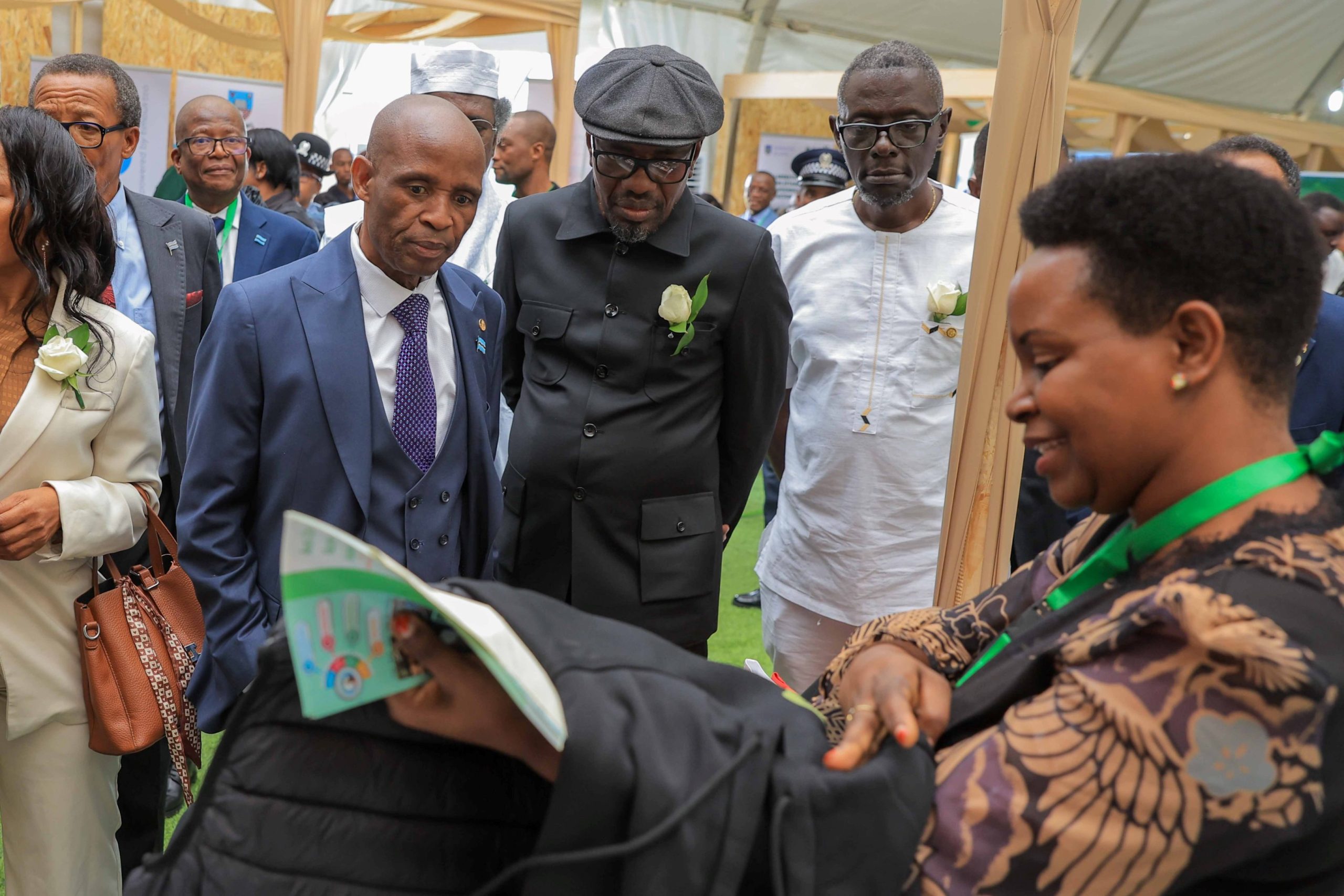 Hon. Prince Maele, Minister of Higher Education who opened the 21st RUFORUM AGM on behalf of the President of Botswana, H.E. Duma Boko tours the Makerere University exhibition accompanied by MoES' Mr. Timothy Musoke Ssejoba (Right) and other officials. Government of Botswana, the host of the Regional Universities Forum for Capacity Building in Agriculture (RUFORUM)’s 21st Annual General Meeting (AGM).