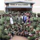 A section of the officer in a group photo at the entrance of the School of Social Sciences, Makerere University. More than 130 cadet officers from Uganda Military Academy (UMA) in Kasambya orientation on library use and access to electronic resources as part of preparations for the Bachelor’s Degree in Defence Studies, 20th November 2025, College of Humanities and Social Sciences (CHUSS), Makerere University, Kampala Uganda, East Africa.