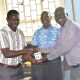 Dr Denis Okello (R) handing over the office stamp to the newly appointed Head, Dr Oruru Bosco. Dr Oruru Bosco appointed Acting Head of the Department of Physics at the College of Natural Sciences (CoNAS), Makerere University, Kampala Uganda, East Africa, effective 1st January 2026. Official handover ceremony, 6th January 2026.