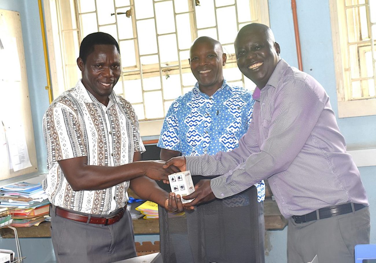 Dr Denis Okello (R) handing over the office stamp to the newly appointed Head, Dr Oruru Bosco. Dr Oruru Bosco appointed Acting Head of the Department of Physics at the College of Natural Sciences (CoNAS), Makerere University, Kampala Uganda, East Africa, effective 1st January 2026. Official handover ceremony, 6th January 2026.