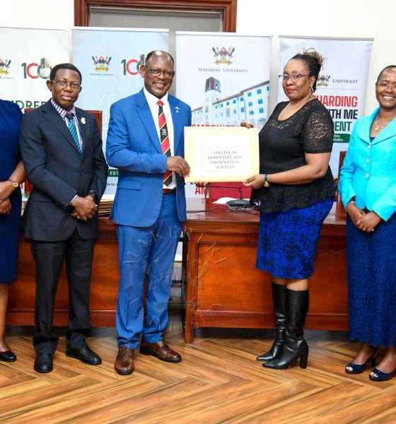 Prof. Barnabas Nawangwe (Centre) presents one of the printed batches of transcripts the Registrar College of Computing and Information Sciences (CoCIS)-Ms. Ruth Iteu Eyoku (2nd Right) as Right to Left: DVCAA-Prof. Sarah Ssali, AR-Prof. Buyinza Mukadasi and Ms. Prossy Nakayiki witness on 28th January 2026. Vice Chancellor's Press Briefing on the 76th Graduation due to be held 24th-27th February 2026 at Makerere University, Kampala Uganda, East Africa.