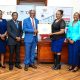 Prof. Barnabas Nawangwe (Centre) presents one of the printed batches of transcripts the Registrar College of Computing and Information Sciences (CoCIS)-Ms. Ruth Iteu Eyoku (2nd Right) as Right to Left: DVCAA-Prof. Sarah Ssali, AR-Prof. Buyinza Mukadasi and Ms. Prossy Nakayiki witness on 28th January 2026. Vice Chancellor's Press Briefing on the 76th Graduation due to be held 24th-27th February 2026 at Makerere University, Kampala Uganda, East Africa.