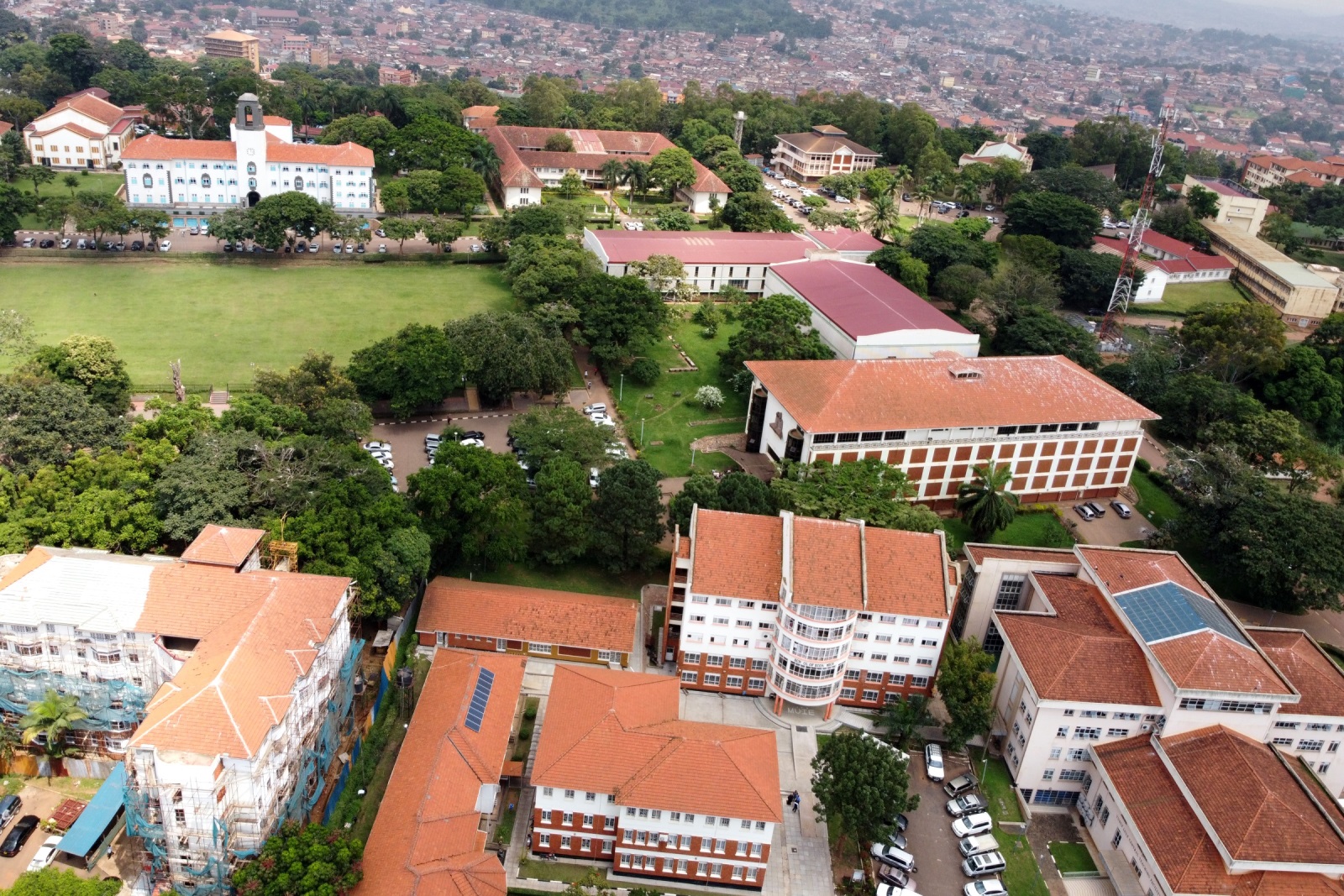 An aerial photo of Clockwise Top Left to Right: St. Francis Chapel, Main Building, CAES, JICA Building, Chemistry Building, Mathematics, School of Statistics, Main Library, Yusuf Lule Central Teaching Facility, CoBAMS, EPRC, IGDS and the Freedom Square. Makerere University, Kampala Uganda, East Africa.
