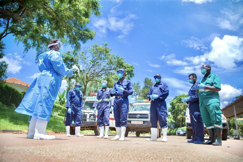 Front-line workers on COVID-19 getting a debrief in Kampala.
