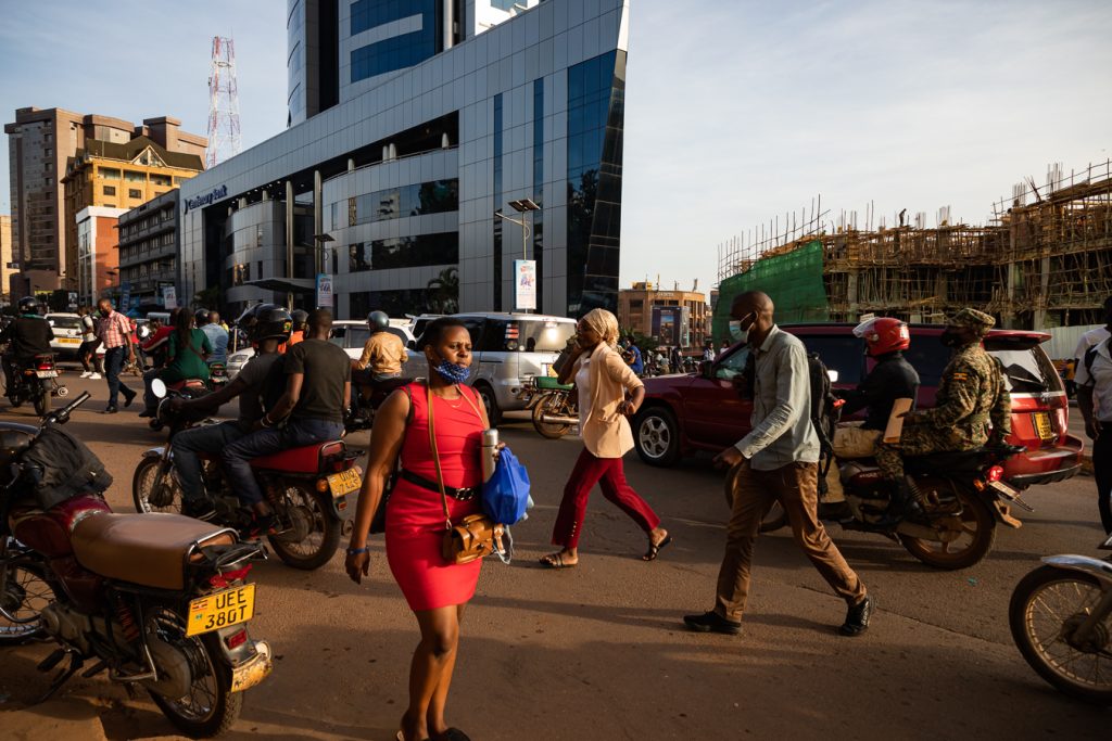 A mix of pedestrians and motorists on a busy Kampala Road in Kampala. Photo by Katumba Badru