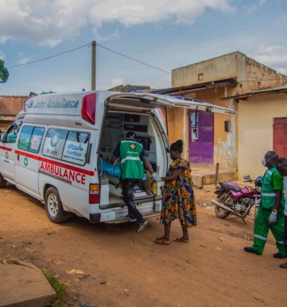 An emergency response team extracts a suspected case from the community during the pandemic.