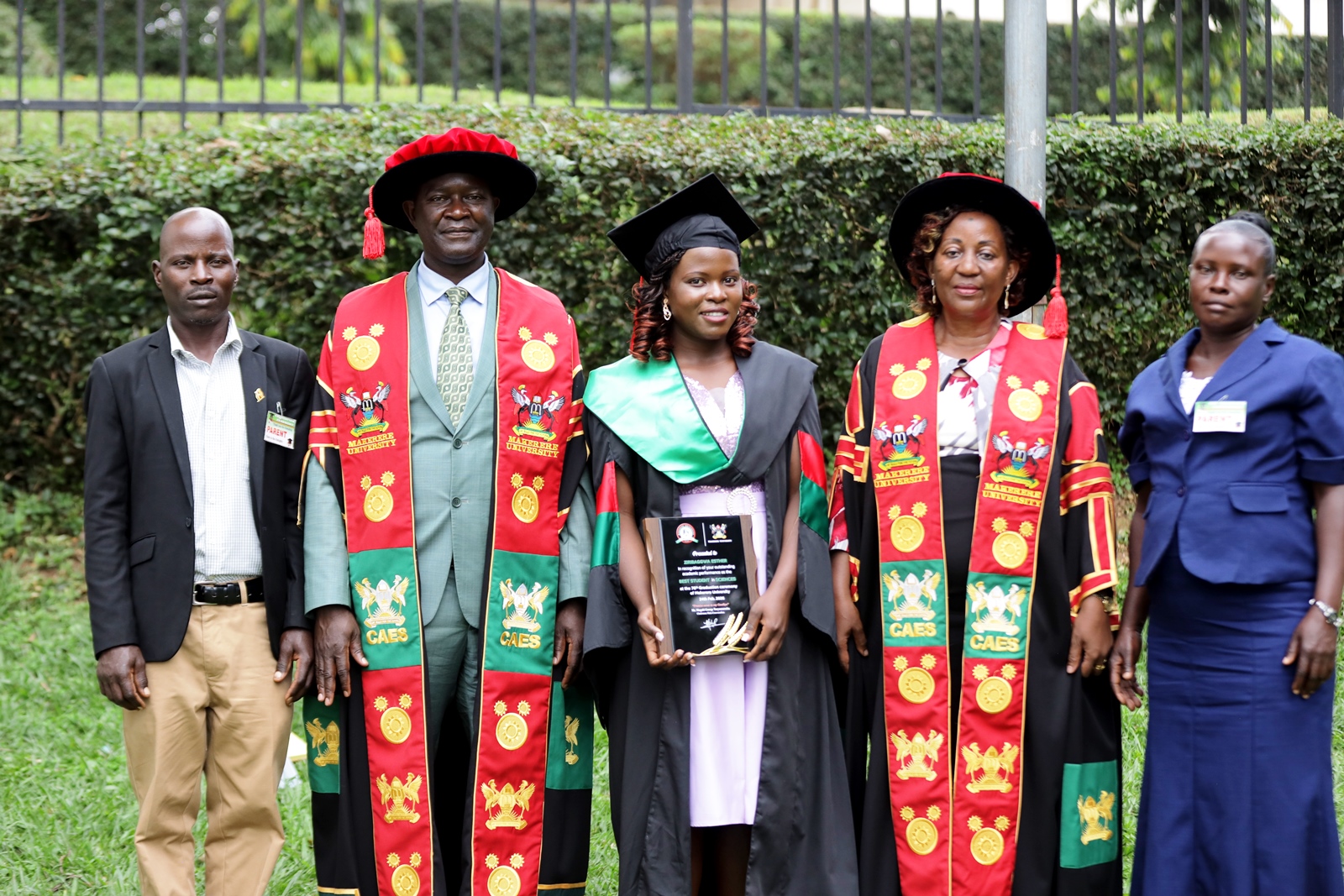 Esther Ziribaggwa being congratulated by the Principal of CAES, Prof. Gorettie Nabanoga, and the Deputy Principal, Prof. Yazidhi Bamutaze. 76th Graduation Ceremony, Day 1, College of Agricultural and Environmental Sciences (CAES). Commencement Speaker-Prof. Nicholas Ozor, the Executive Director of the African Technology Policy Studies Network, Nairobi, Kenya. 24th February 202, Freedom Square, Makerere University, Kampala Uganda, East Africa.