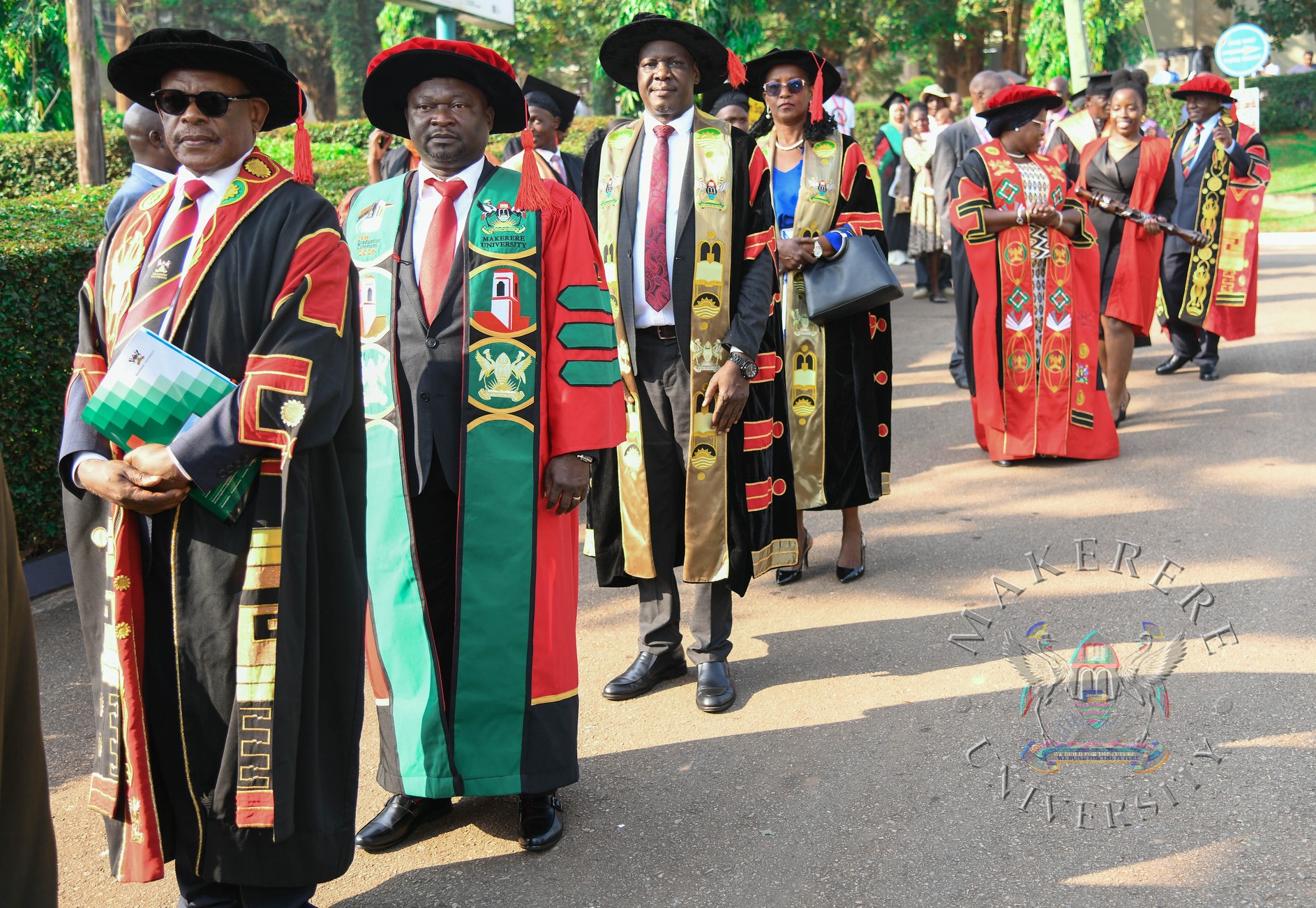 Left to Right: Prof. Barnabas Nawangwe,Prof. Nicholas Ozor, Rt. Hon. Daniel Kidega, Dr. Lorna Magara, Hon. Dr. Joyce Moriku Kaducu, Ms. Anthea Ampaire and Hon. Dr. Crispus Kiyonga in the academic procession. 76th Graduation Ceremony, Day 1, CAES, CoCIS, CEES and School of Law. Commencement Speaker-Prof. Nicholas Ozor, the Executive Director of the African Technology Policy Studies Network, Nairobi, Kenya. 24th February 202, Freedom Square, Makerere University, Kampala Uganda, East Africa.
