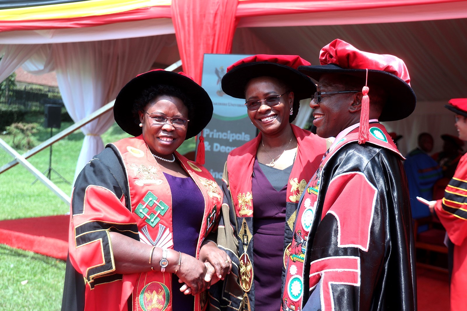 The Minister of State for Primary Education, Hon. Dr. Joyce Moriku Kaducu, the DVCAA, Prof. Sarah Ssali, and the Academic Registrar, Prof. Buyinza Mukadasi share a light moment at the ceremony. 76th Graduation Ceremony, Day 2, College of Natural Sciences (CoNAS). Commencement Speaker-Dr. Margaret J. Kigozi, Makerere University Endowment Fund Chairperson. 25th February 2026, Freedom Square, Kampala Uganda, East Africa.