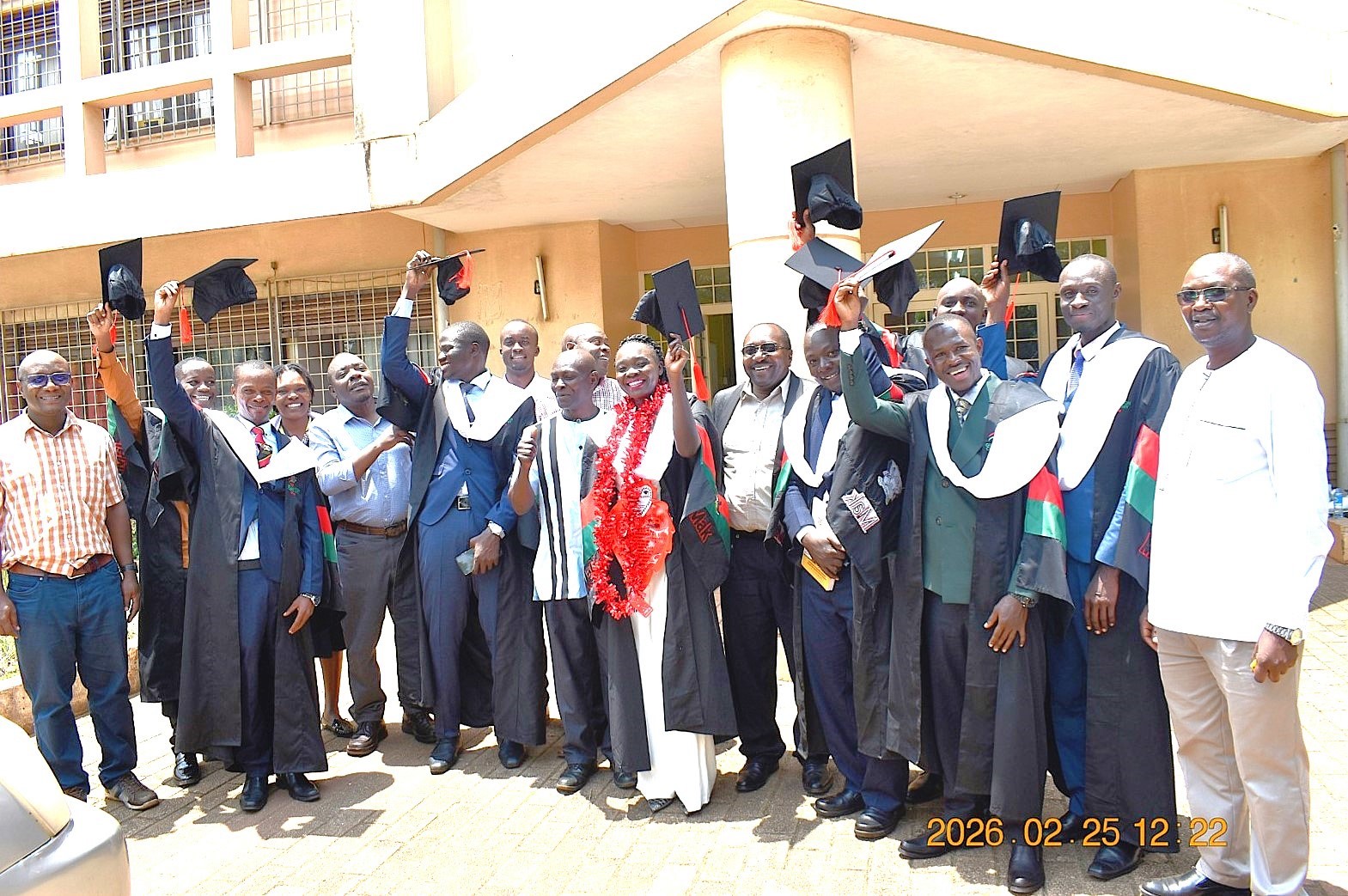Some of the Masters graduates from the Department of Biochemistry and Systems Biology celebrating with their lecturers. 76th Graduation Ceremony, Day 2, College of Natural Sciences (CoNAS). Commencement Speaker-Dr. Margaret J. Kigozi, Makerere University Endowment Fund Chairperson. 25th February 2026, Freedom Square, Kampala Uganda, East Africa.