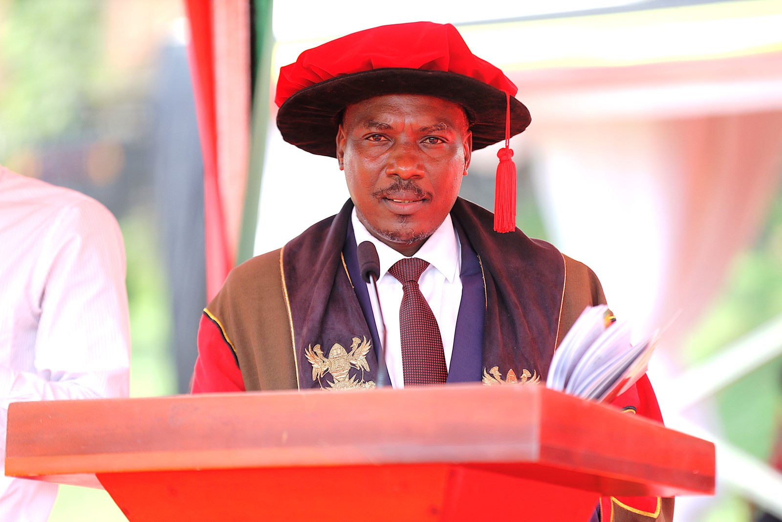 The Principal of CoNAS, Prof. Winston Tumps Ireeta presenting PhD graduates. 76th Graduation Ceremony, Day 2, College of Natural Sciences (CoNAS). Commencement Speaker-Dr. Margaret J. Kigozi, Makerere University Endowment Fund Chairperson. 25th February 2026, Freedom Square, Kampala Uganda, East Africa.