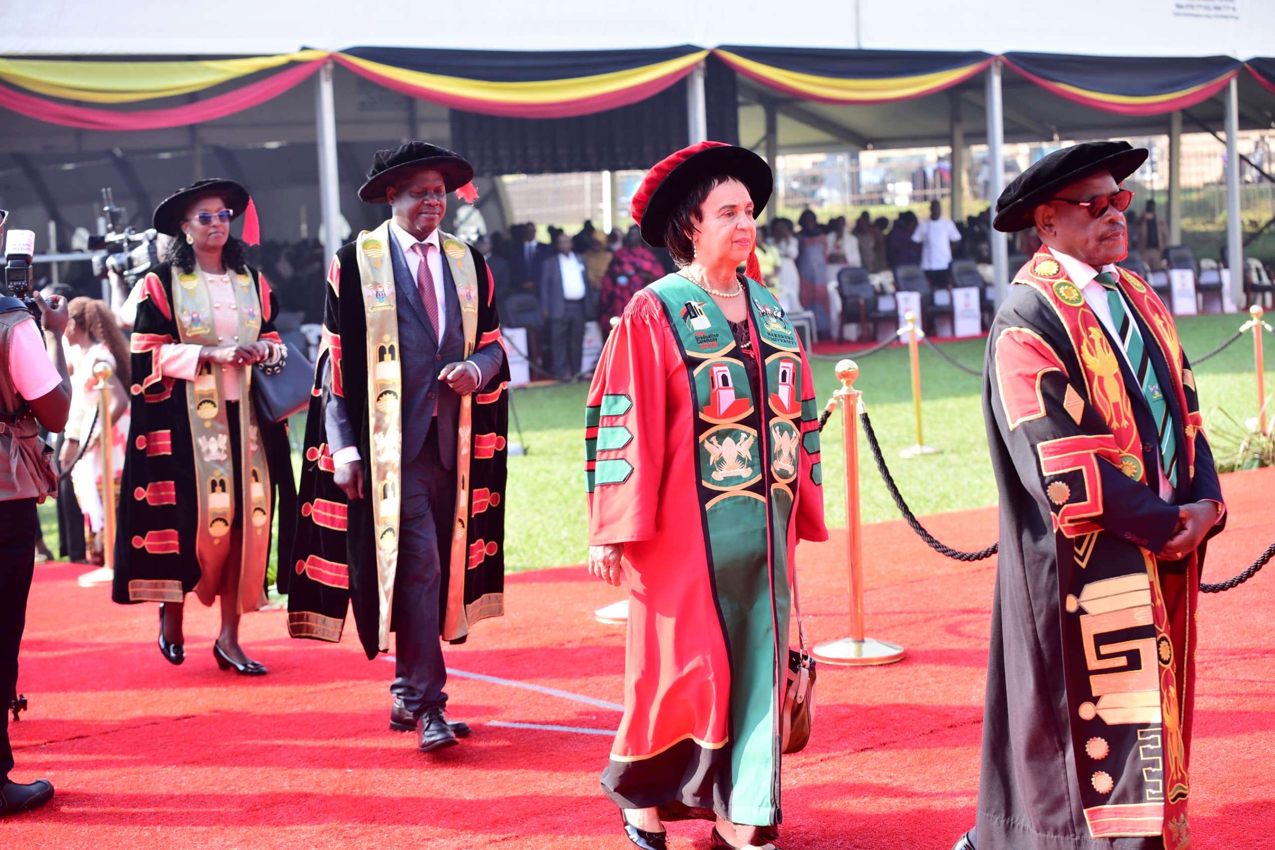 R-L: Vice Chancellor-Prof. Barnabas Nawangwe, Dr. Maggie Kigozi, Vice Chair Council-Rt. Hon. Daniel Kidega and Chair Council-Dr. Lorna Magara in the Academic Procession. 76th Graduation Ceremony, Day 2, College of Natural Sciences (CoNAS), the College of Veterinary Medicine, Animal Resources and Bio-Security (CoVAB), the College of Health Sciences (CHS) and the School of Public Health (SPH). Commencement Speaker-Dr. Margaret J. Kigozi, Makerere University Endowment Fund Chairperson. 25th February 2026, Freedom Square, Kampala Uganda, East Africa.