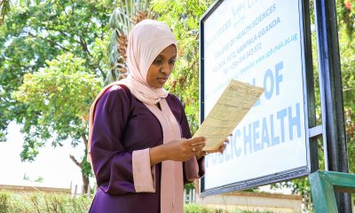 Bushirah Nakulima a Bachelor of Environmental Health Science (BEHS) student who will be graduating with a CGPA of 4.58 on February 25, 2026 looks at a transcript. 76th Graduation Ceremony, Day 2, School of Public Health Bachelor of Environmental Health Science (BEHS) degree profiles, 25th February 2026, Freedom Square, Makerere University, Kampala Uganda, East Africa.