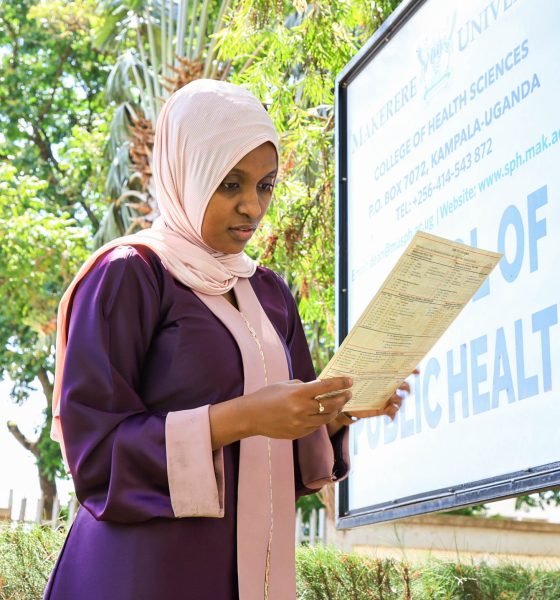 Bushirah Nakulima a Bachelor of Environmental Health Science (BEHS) student who will be graduating with a CGPA of 4.58 on February 25, 2026 looks at a transcript. 76th Graduation Ceremony, Day 2, School of Public Health Bachelor of Environmental Health Science (BEHS) degree profiles, 25th February 2026, Freedom Square, Makerere University, Kampala Uganda, East Africa.