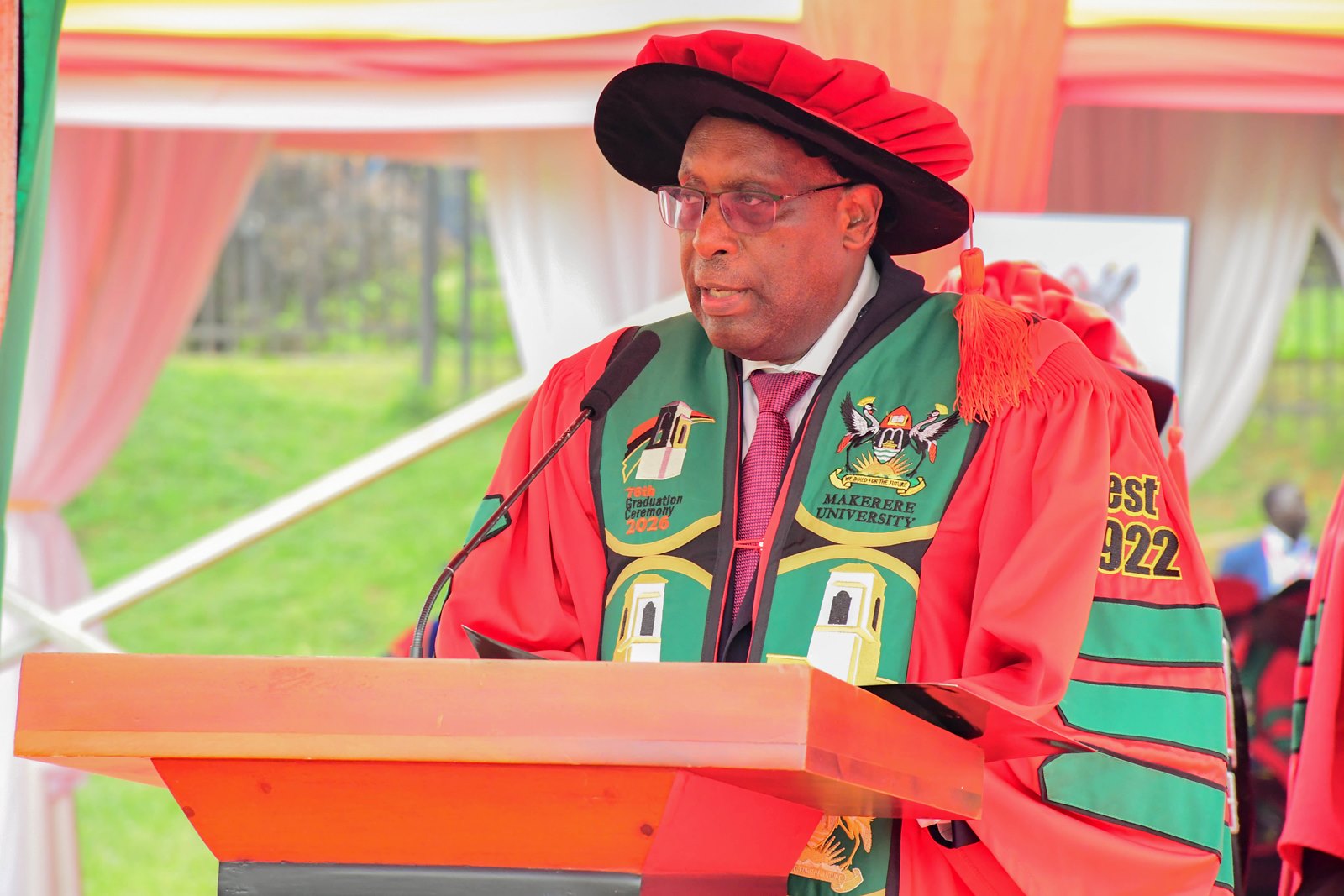 Dr. Japheth Buleetwa Katto delivering his acceptance speech for the Doctor of Letters (Honoris Causa) at the 76th graduation. 76th Graduation Ceremony, Day 3, College of Business and Management Sciences (CoBAMS). Commencement Speaker-Dr. Patricia Adongo Ojangole, Managing Director, Uganda Development Bank Limited. 26th February 2026, Freedom Square, Makerere University, Kampala Uganda, East Africa.