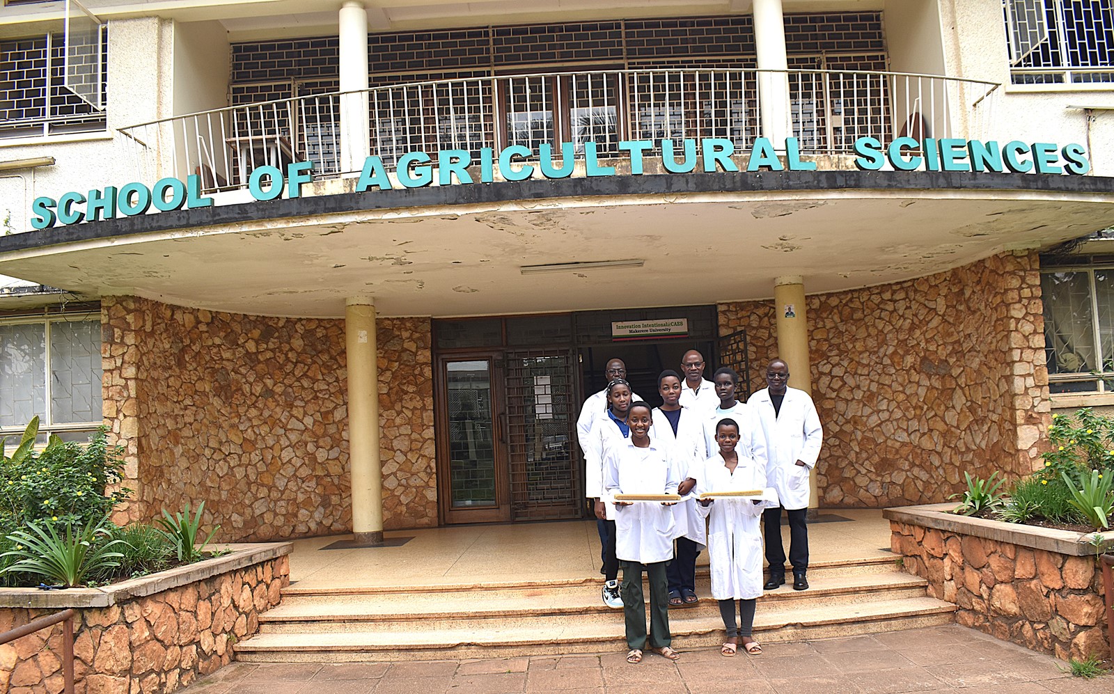 The Students with their supervisors at CAES, Makerere University. Project to convert organic solid market waste (biodegradable garbage) into an industrial raw material for soap production by utilizing saprophagous Black Soldier Fly larvae (BSFL) to accumulate lipids and applying the scientific process of saponification by Senior Four students of Uganda Martyrs Secondary School Namugongo, February 2026, College of Agricultural and Environmental Sciences (CAES), Makerere University, Kampala Uganda, East Africa.