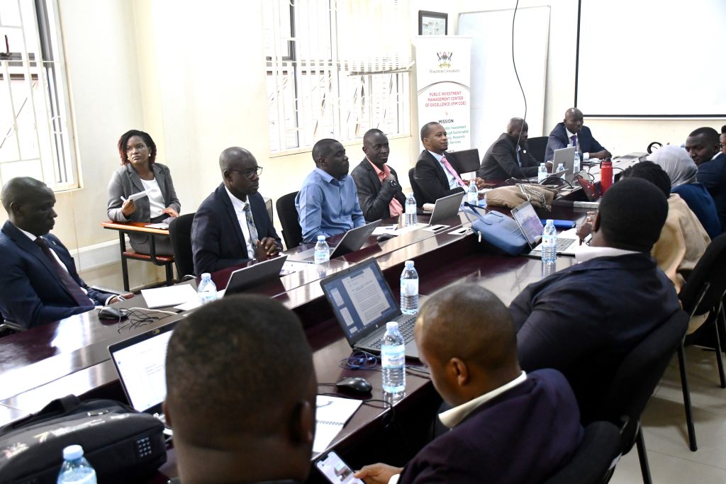 Participants follow proceedings. Parliament of Uganda, in collaboration with the Ministry of Finance, Planning and Economic Development and Public Investment Management (PIM) Centre of Excellence at Makerere University launch five-day intensive training programme on Integrated Macroeconomic Modelling to strengthen fiscal governance and enhancing evidence-based decision-making, February 2026, Kampala Uganda, East Africa.