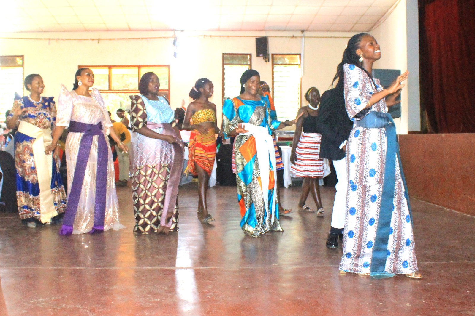 Ladies showcasing the gomesi, Baganda women traditional wear. Mastercard Foundation Scholars Program at Makerere University annual cultural dinner to reconnect the Scholars community, share key Program updates, and create an inclusive space to strengthen belonging and engagement, 13th February 2026, Kampala Uganda, East Africa.