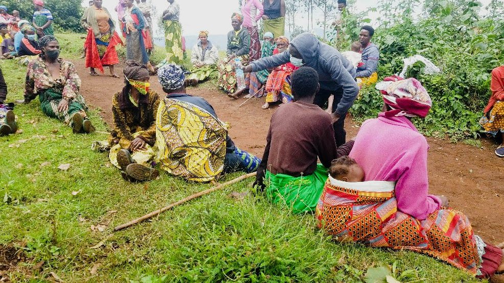 A medical student facilitates a Community-Led Total Sanitation (CLTS) session, guiding community members through a participatory “triggering” exercise to confront open defecation practices. Makerere University School of Public Health Communications Office, Graduation Profiles Series, 76th Graduation Ceremony, Moses Ntaro, “Effect of Student Community Engagement on Open Defecation-Free Status,” Kampala Uganda, East Africa.