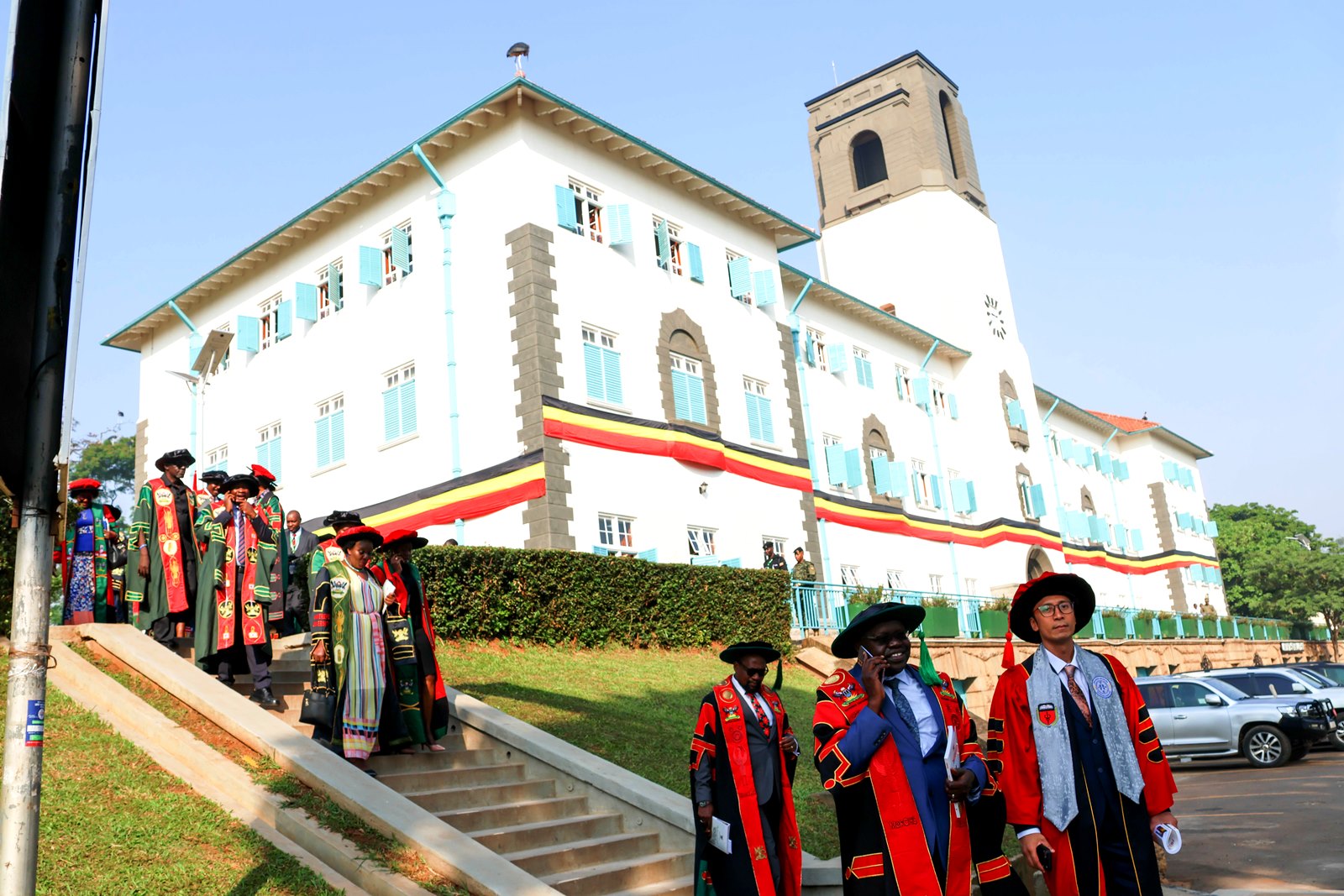 The Principal-Prof. Bruce Kirenga (3rd R), Deputy Principal-Prof. Richard Idro (2nd R) and other staff in the academic procession on 25th February 2026 against the backdrop of the Main Building. 76th Graduation Ceremony, Day 2, College of Health Sciences (CHS). Commencement Speaker-Dr. Margaret J. Kigozi, Makerere University Endowment Fund Chairperson. 25th February 2026, Freedom Square, Kampala Uganda, East Africa.