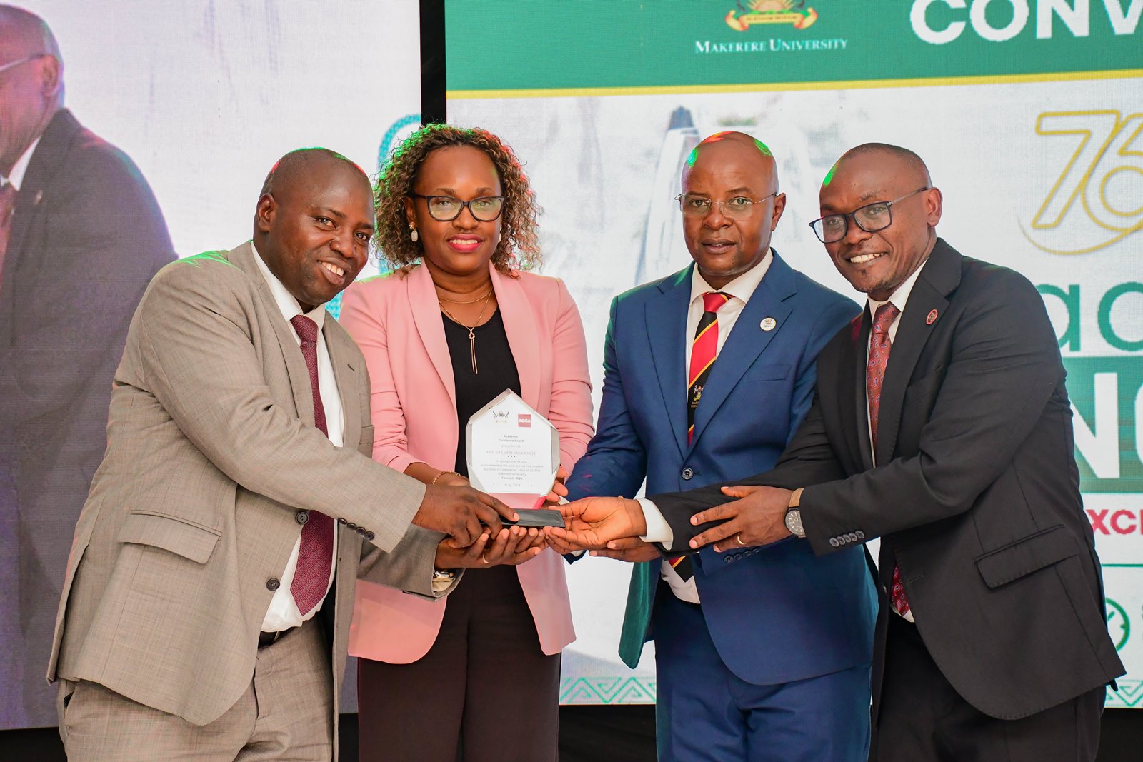 ACCA-Uganda presents an award to the best student in Accounting. Steven Makande graduated with a Bachelor of Commerce (Accounting). His award was received by Dr. Eric Nzibonera, Head-Dept of Accounting & Finance. 76th Graduation Ceremony, Day 3, College of Business and Management Sciences (CoBAMS) Vice Chancellors Research Excellence Awards at Convocation House, Edge Road. 26th February 2026, Makerere University, Kampala Uganda, East Africa.