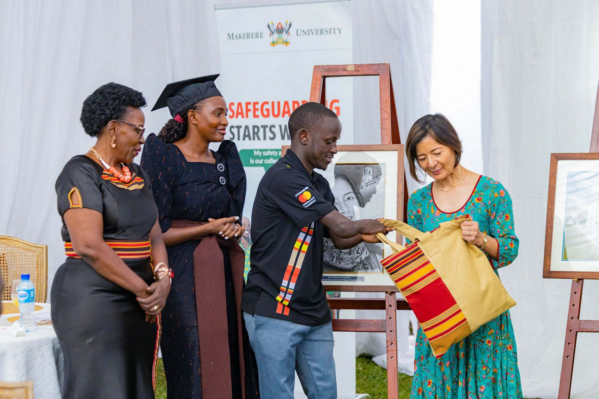 Ms. Reeta Roy receiving a gift from the Mastercard Foundation Scholars and alumni Community at Makerere University. Celebrating 13 years of a significant partnership with the Mastercard Foundation and honorary Doctor of Laws conferred upon Ms. Reeta Roy, the Founding President and CEO of the Mastercard Foundation, 27th February 2026, Makerere University, Kampala Uganda, East Africa.