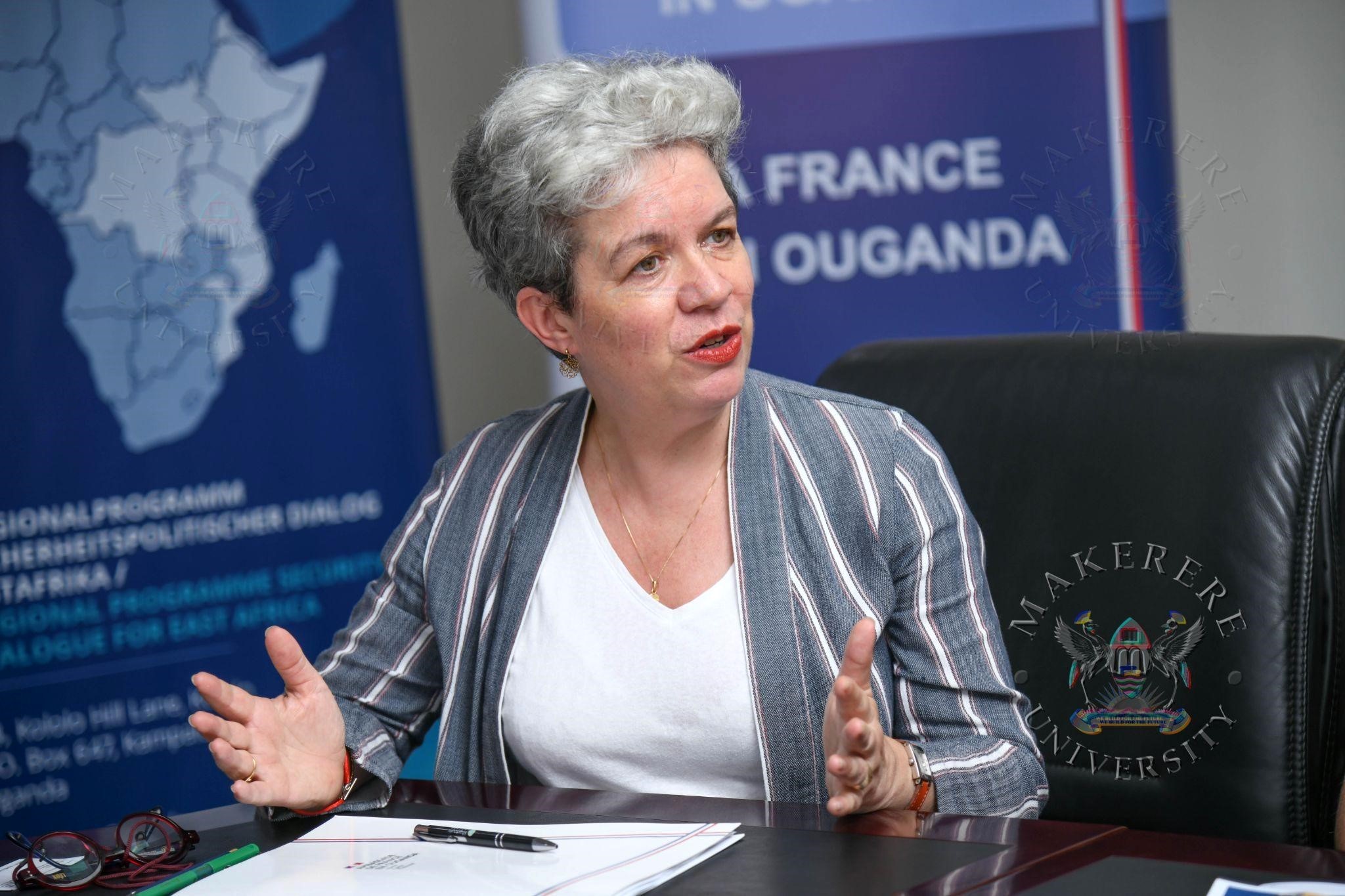 H.E. Virginie Leroy reading her remarks at the signing of the KGC 2026 MoU. Signing the MoU with the Embassy of France in Uganda, the Konrad Adenauer Foundation (KAS), and Alliance Française de Kampala to organize the 9th edition of the Kampala Geopolitics Conference (KGC), 15–16 April 2026 at Makerere University, Kampala Uganda, East Africa.