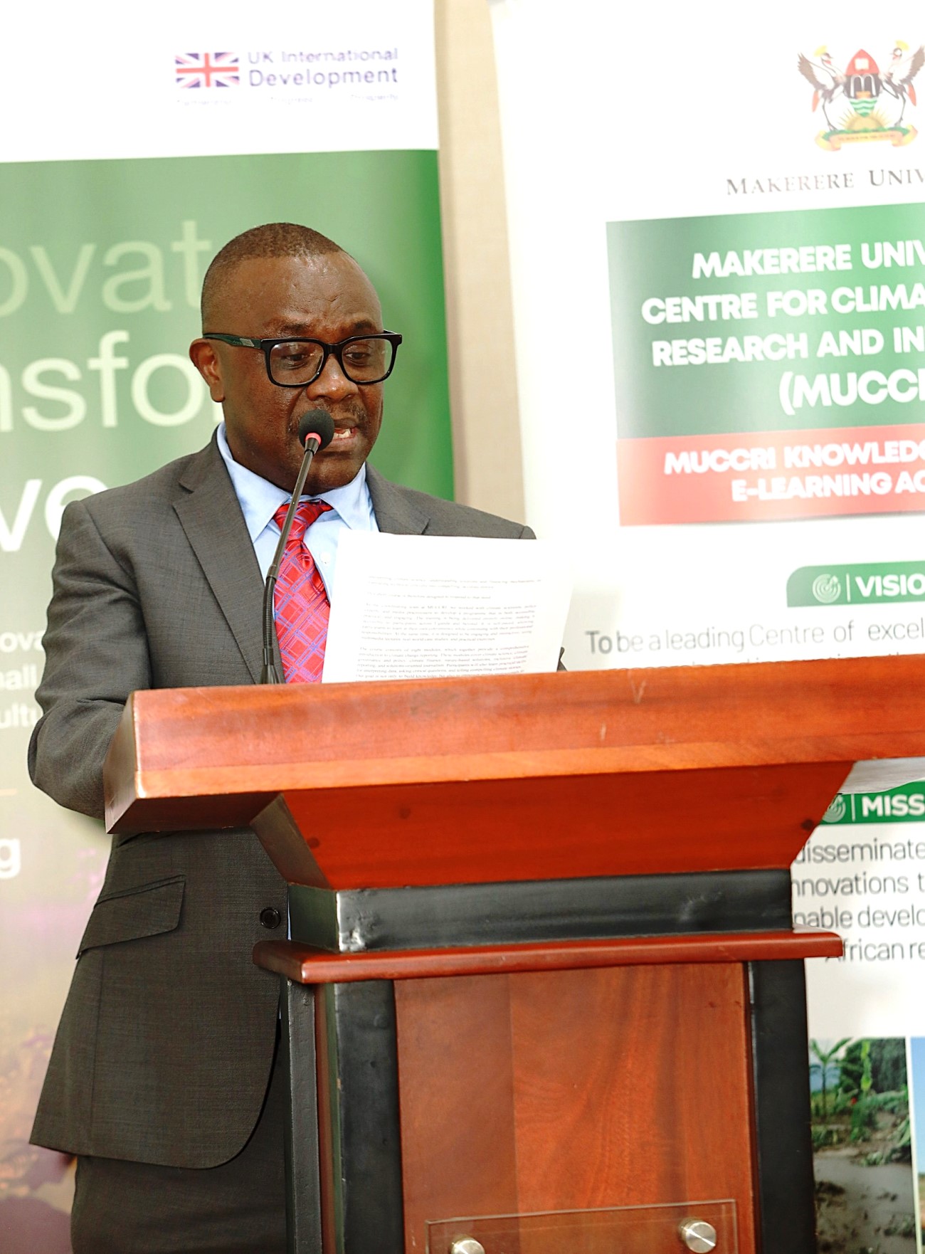 Prof. Revocatus Twinomuhangi, Director of MUCCRI briefing participants about the course. Launch of specialized short training course developed by Makerere University Centre for Climate Change Research and Innovation (MUCCRI) aimed at equipping media practitioners and digital content creators with knowledge and skills to effectively report on climate change and related environmental issues by British High Commissioner to Uganda, H.E. Lisa Chesney, 5th March 2026, Senior Common Room, Main Building, Kampala Uganda, East Africa.