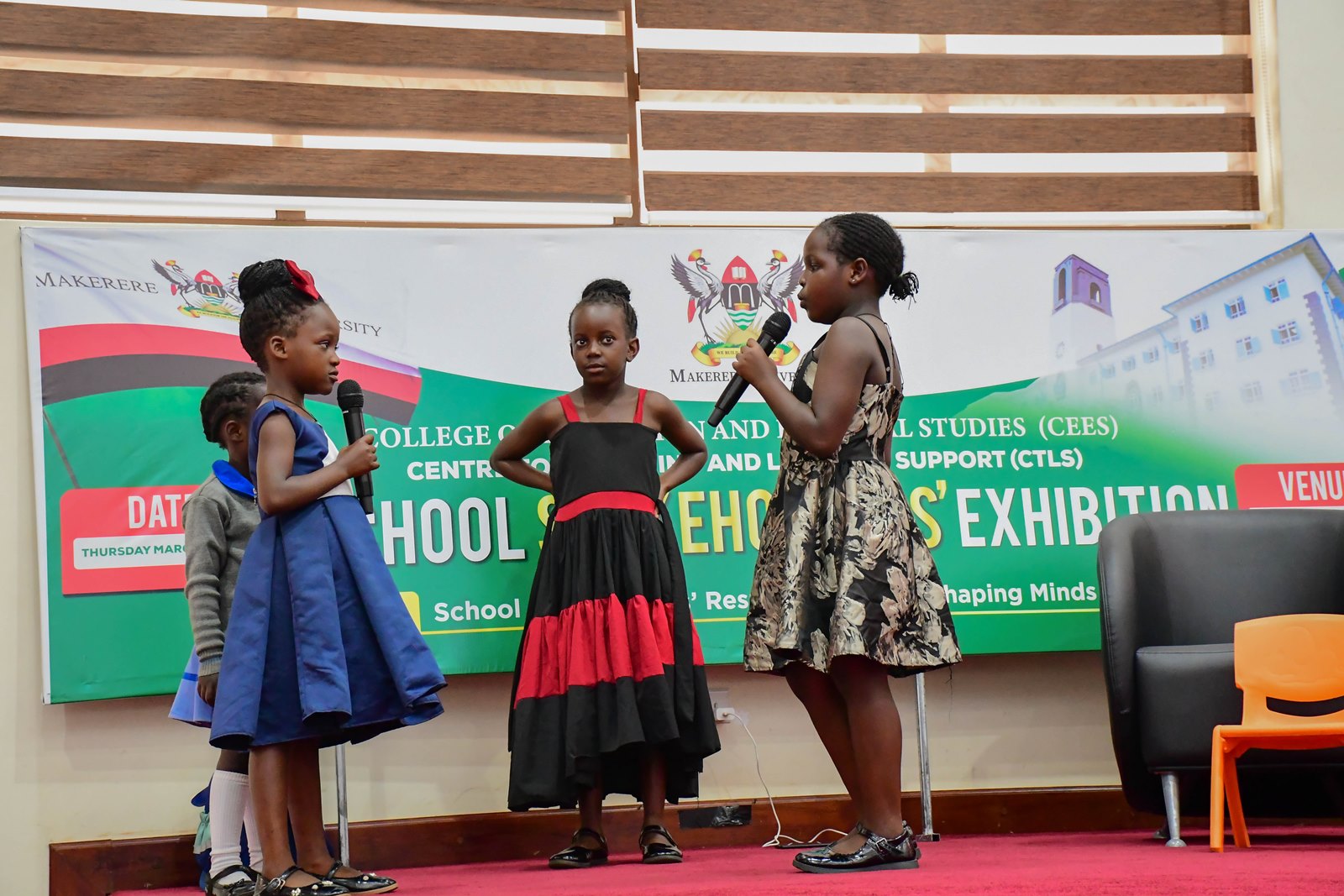 Learners equipped with ECD techniques in a role play enhancing CBC. School Stakeholders’ Exhibition, bringing together learners, teachers, researchers, and education policymakers to demonstrate how Uganda’s Competence Based Curriculum (CBC) can be implemented through experiential learning and real-life situations, by graduate students of College of Education and External Studies (CEES) and College of Humanities and Social Sciences (CHUSS) guided by Dr. Anne Ampaire, 26th March 2026, Makerere University School of Public Health Auditorium, Kampala Uganda, East Africa.