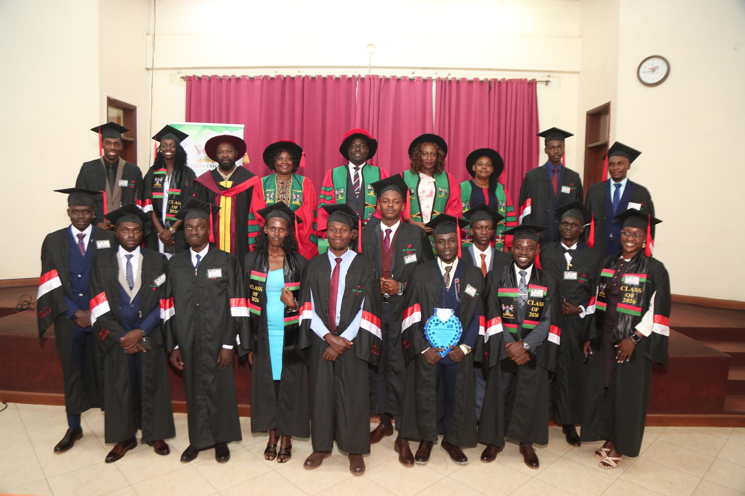 EXCELLENCE REWARDED: Prof. Paul Muyinda Birevu, representing the Principal of CEES, Prof. Anthony Muwagga Mugagga, stands with First-Class Diploma graduates and university administrators. The ceremony celebrated the “sleepless nights and tuition sacrifices” of the students and their families. 200 students examined by the Uganda Vocational and Technical Assessment Board (UVTAB) awarded National Diplomas and Certificates during the 7th graduation ceremony on 28th February 2026 organized by the Centre for Lifelong Learning (CLL) under the College of Education and External Studies (CEES). Ceremony held in the Conference Hall, College of Engineering, Design, Art and Technology (CEDAT), at Makerere University, Kampala Uganda, East Africa.