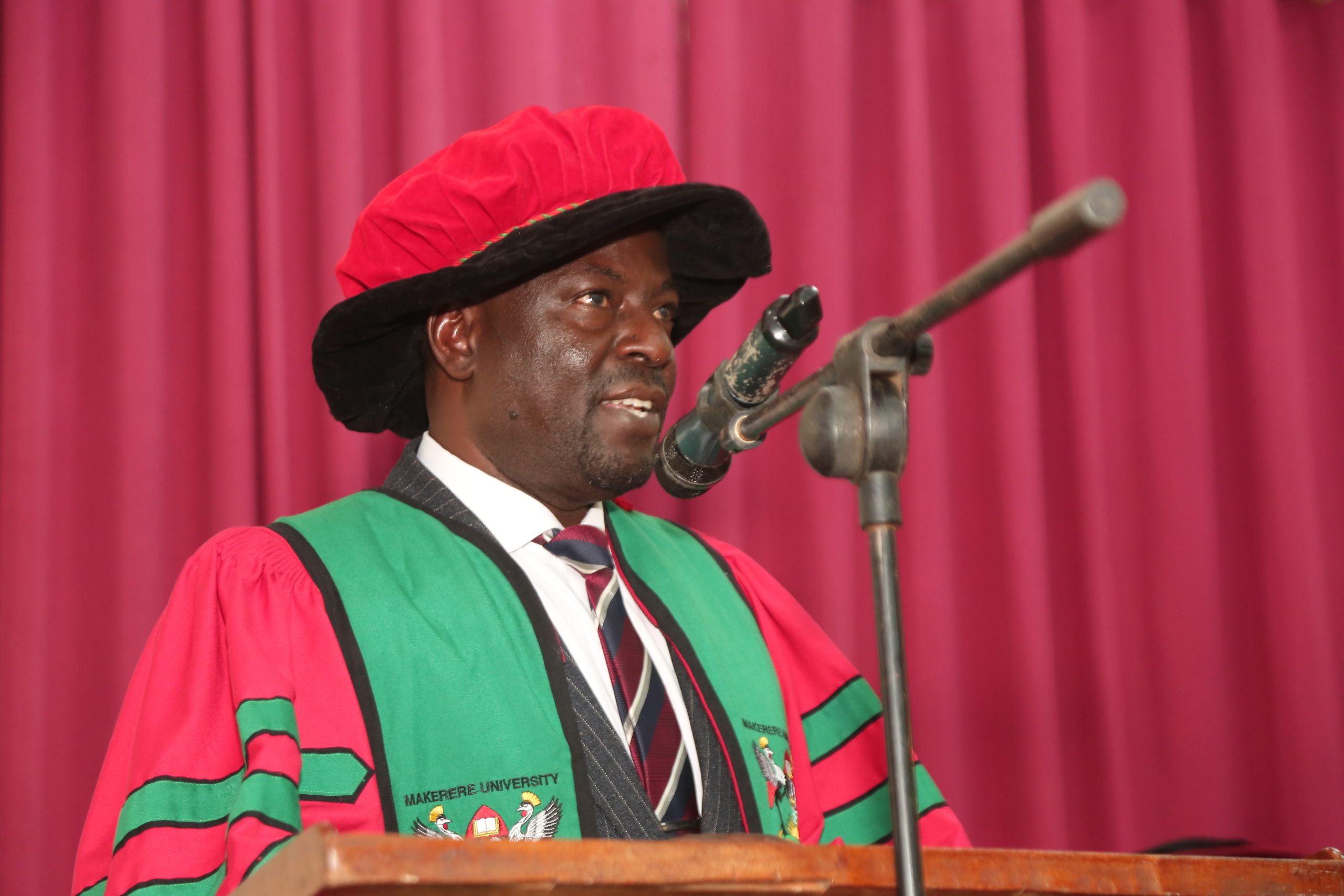 Prof. Paul Muyinda Birevu (Director, Institute of Open, Distance and e-Learning) representing Prof. Anthony Muwagga Mugagga (Principal, CEES),presenting his remarks at the Centre for Lifelong Learning (CLL) 7th graduation ceremony. 200 students examined by the Uganda Vocational and Technical Assessment Board (UVTAB) awarded National Diplomas and Certificates during the 7th graduation ceremony on 28th February 2026 organized by the Centre for Lifelong Learning (CLL) under the College of Education and External Studies (CEES). Ceremony held in the Conference Hall, College of Engineering, Design, Art and Technology (CEDAT), at Makerere University, Kampala Uganda, East Africa.