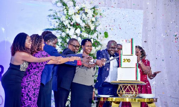 A photo moment from the cake-cutting ceremony at the #MakCHSDinner. Makerere University College of Health Sciences celebrates 100 years of training health professionals, 6th March 2026, Nile Hall, Hotel Africana, Kampala Uganda, East Africa.