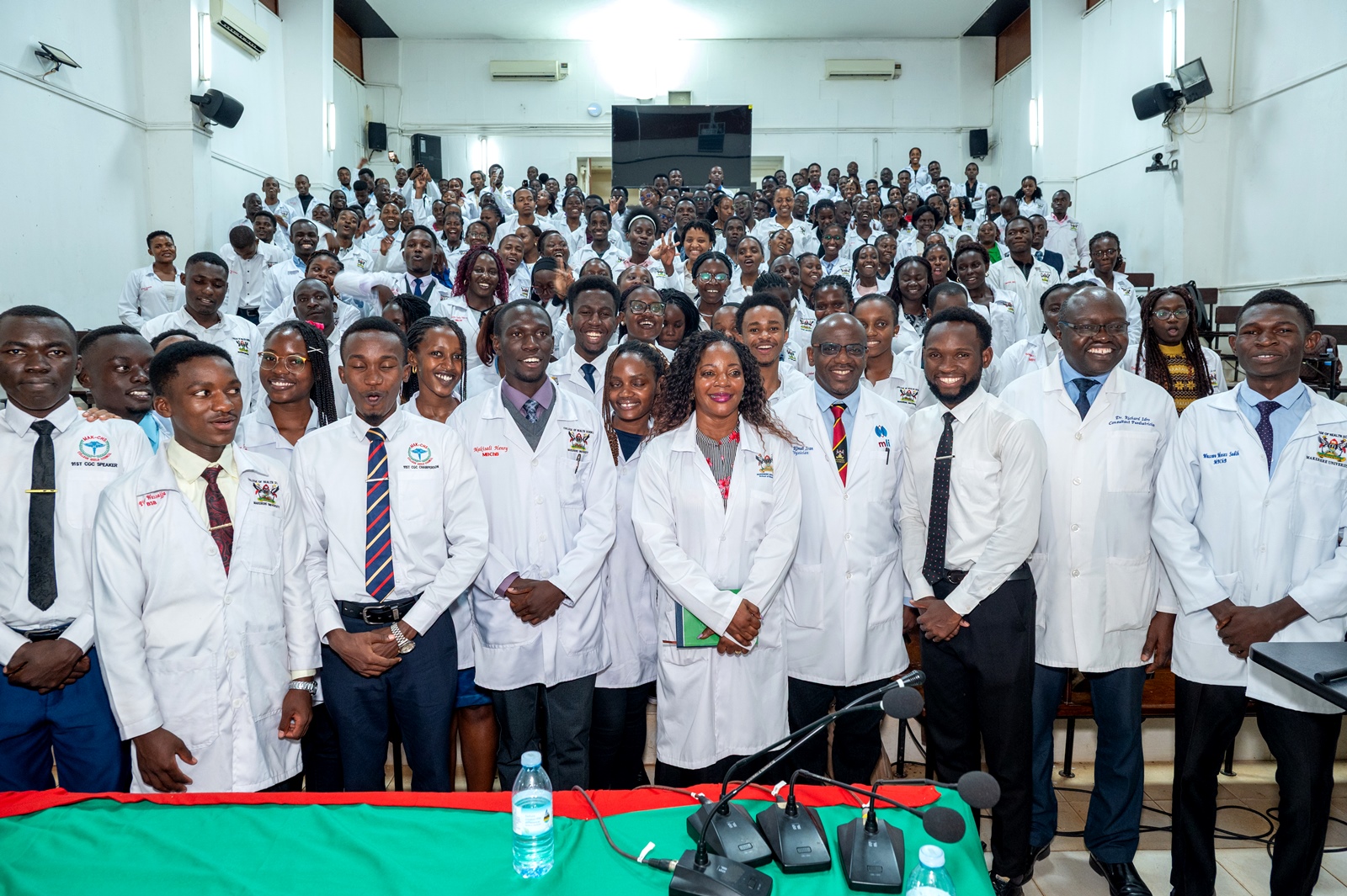 Dr Idro Richard (2nd R) with officials and students at the event. White Coat Ceremony for Medical students, 12th March 2026, College of Health Sciences, Mulago Campus, Makerere University, Kampala Uganda, East Africa.