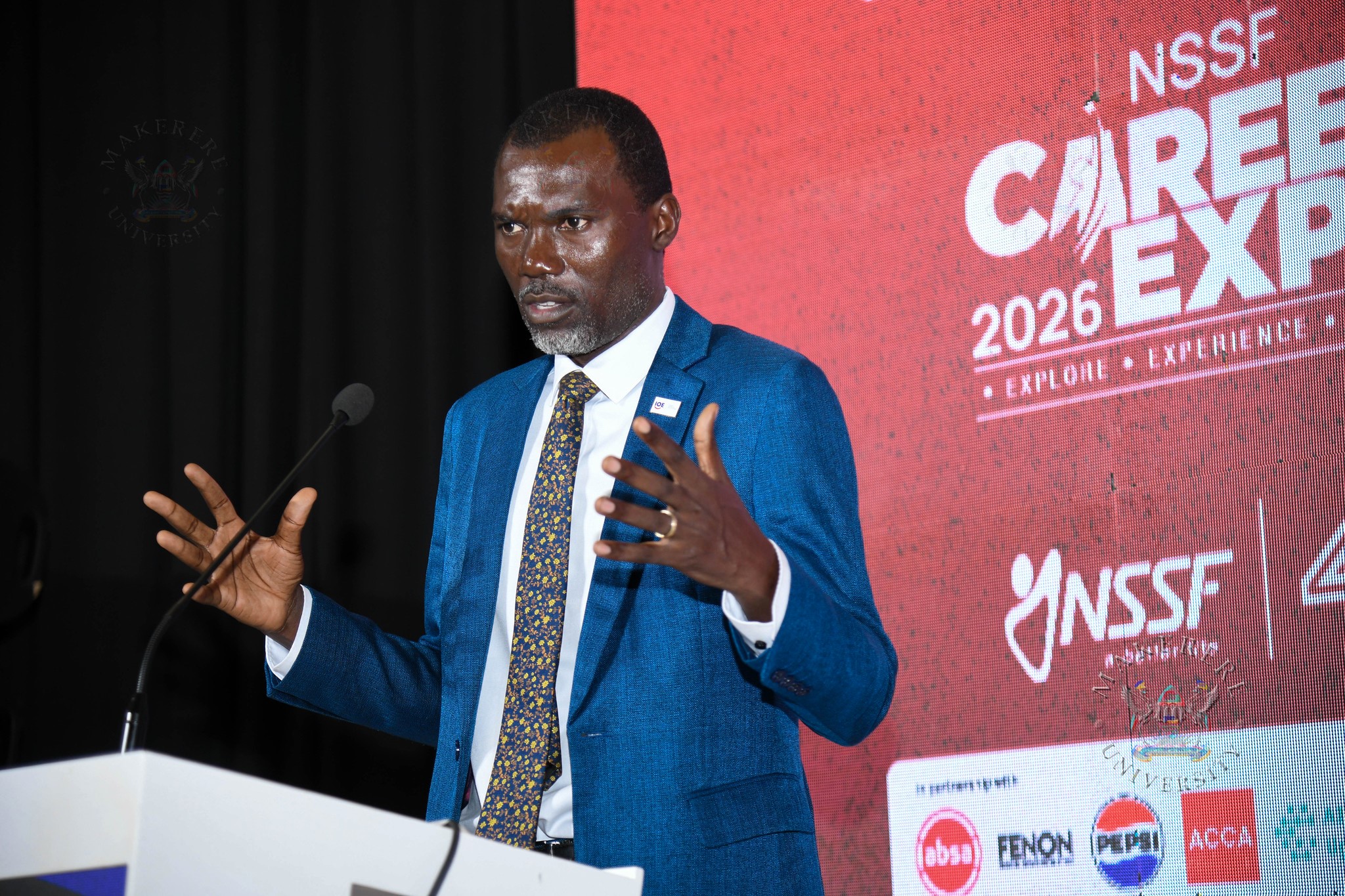 Douglas Opio. Three-day Careers Fair 2026, bringing together students, industry leaders, and policymakers to discuss the future of work in the era of Artificial Intelligence (AI), Day 1 held under the theme “Machine vs. Man” and sponsored by the National Social Security Fund (NSSF), 11th March 2026, Yusuf Lule Central Teaching Facility Auditorium, Makerere University, Kampala Uganda, East Africa.