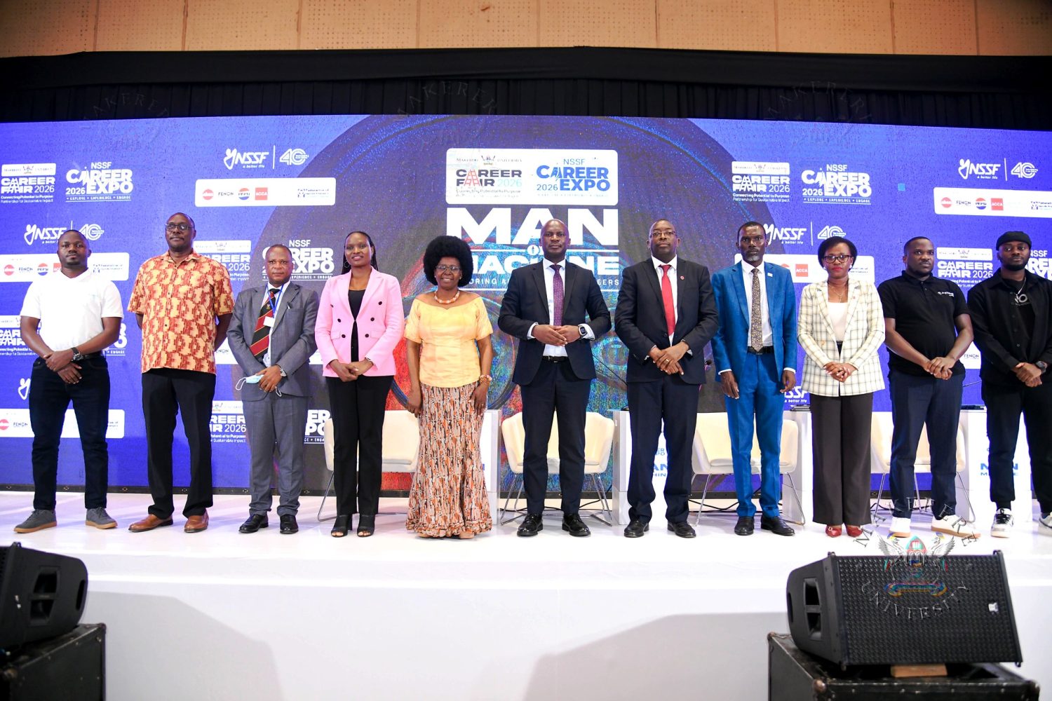 Chief Guest-Hon. Dr. Monica Musenero (5th L) with Prof. Moses Musinguzi (3rd L), Chair Organising Committee-Prof. Anthony Gidudu and other Speakers on Day 1 of the Makerere Careers Fair. Three-day Careers Fair 2026, bringing together students, industry leaders, and policymakers to discuss the future of work in the era of Artificial Intelligence (AI), Day 1 held under the theme “Machine vs. Man” and sponsored by the National Social Security Fund (NSSF), 11th March 2026, Yusuf Lule Central Teaching Facility Auditorium, Makerere University, Kampala Uganda, East Africa.