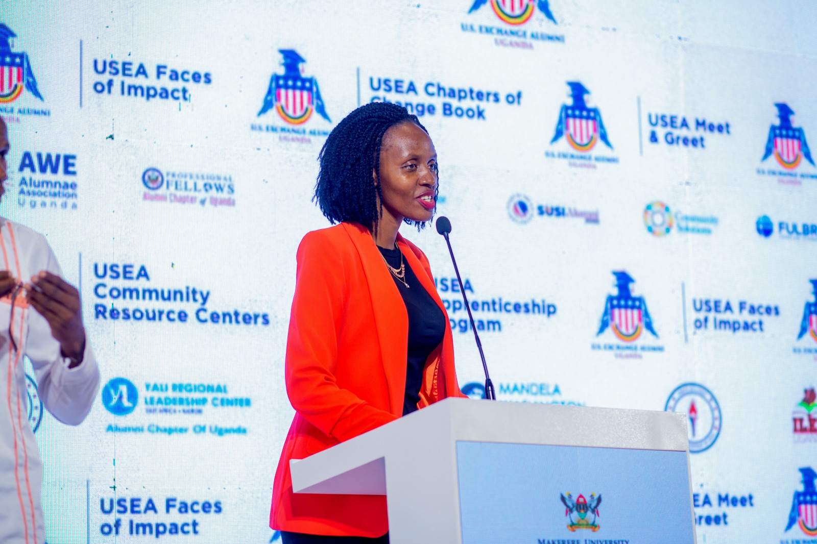 Ms. Blessing Owomugisha Immaculate addresses students.Three-day Careers Fair 2026, bringing together students, industry leaders, and policymakers to discuss the future of work in the era of Artificial Intelligence (AI), Day 2 held under the theme “Scholarship and fellowship opportunities for students and graduates in the United States (US)”, 12th March 2026, Yusuf Lule Central Teaching Facility Auditorium, Makerere University, Kampala Uganda, East Africa.