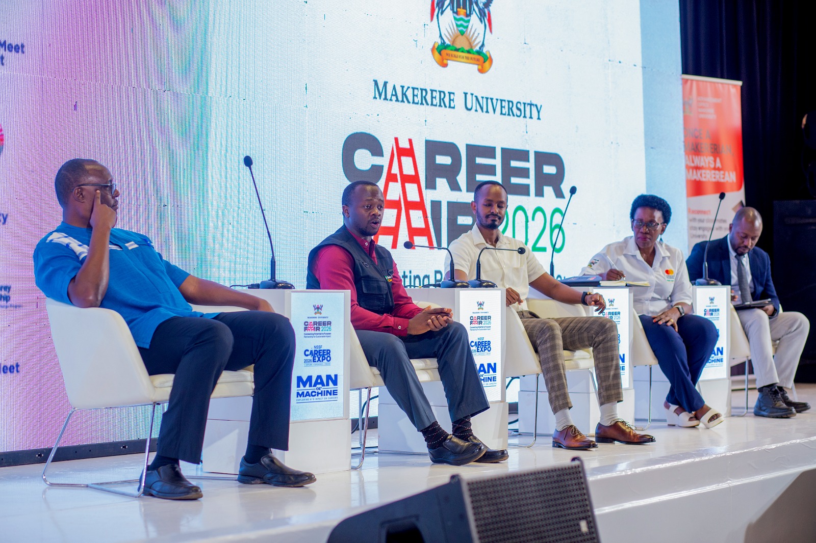 Mr. Joseph Luswabi (2nd L) shares his experience. Three-day Careers Fair 2026, bringing together students, industry leaders, and policymakers to discuss the future of work in the era of Artificial Intelligence (AI), Day 2 held under the theme “Scholarship and fellowship opportunities for students and graduates in the United States (US)”, 12th March 2026, Yusuf Lule Central Teaching Facility Auditorium, Makerere University, Kampala Uganda, East Africa.