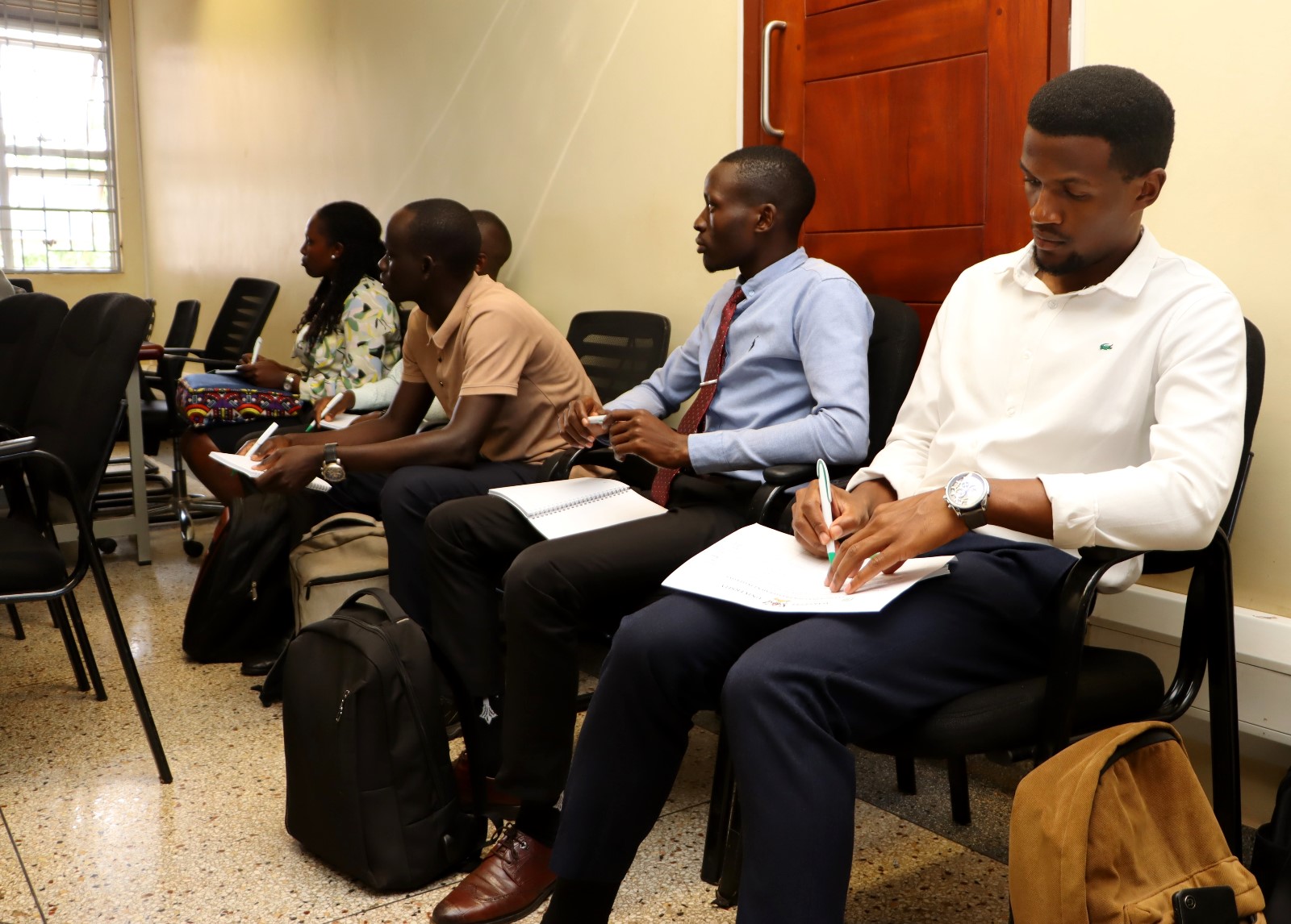 Some of the graduate students attending the seminar. Environment for Development (EfD) Centre research seminar by UK-based Duke University Postdoctoral Scholar Dr. Danny Tobin's study titled, “Guiding Private Afforestation to raise public-Goods Provision : Exploring Farmers preferences for trees within an NGO Tree planting program in Southern India” 9th March 2026, Yusuf Lule Central Teaching Facility, Makerere University, Kampala Uganda, East Africa.